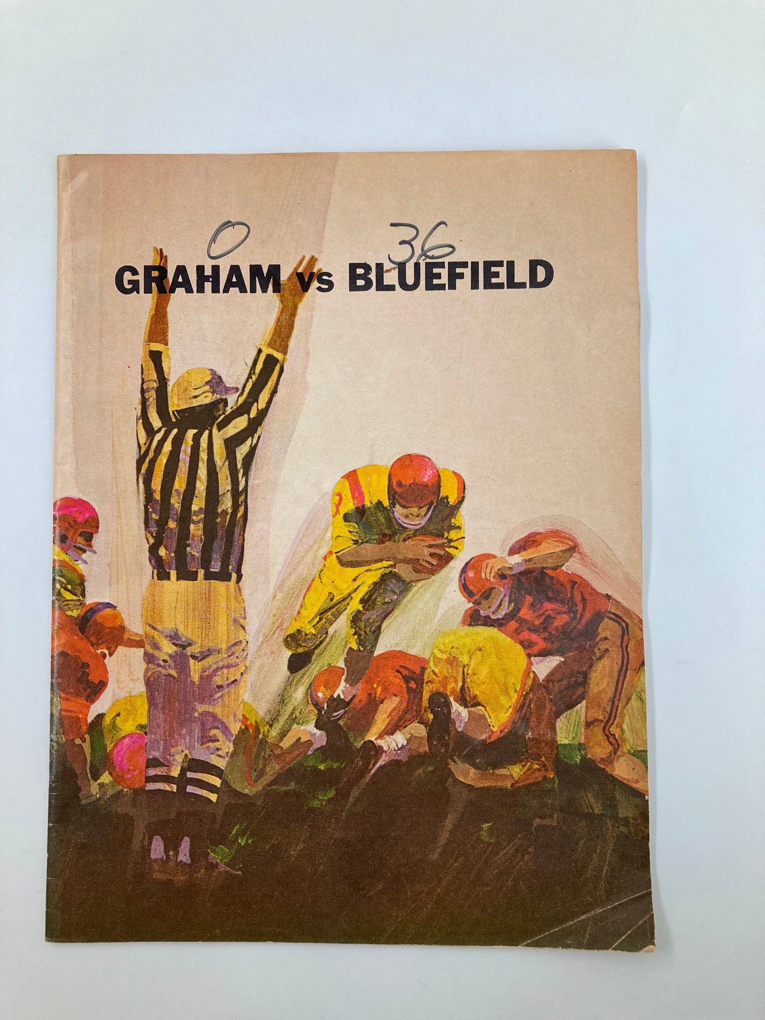 Cover of the 1949 High School Football Graham G-Men vs Bluefield Beavers Official Program featuring a referee signaling during the game.