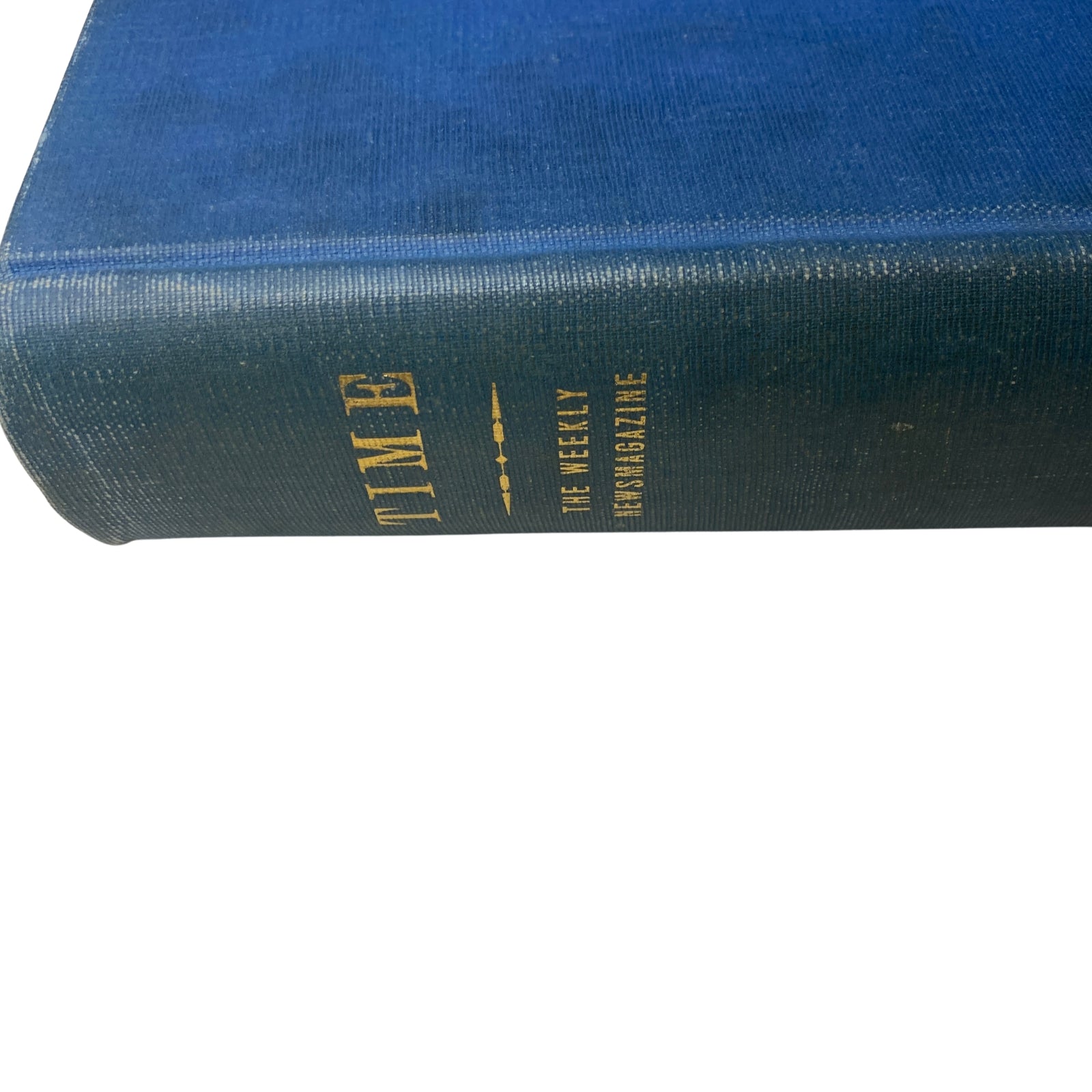 Side view of a blue hardcover bound volume of Time Magazine, indicating the collection spans from July to September 1946.