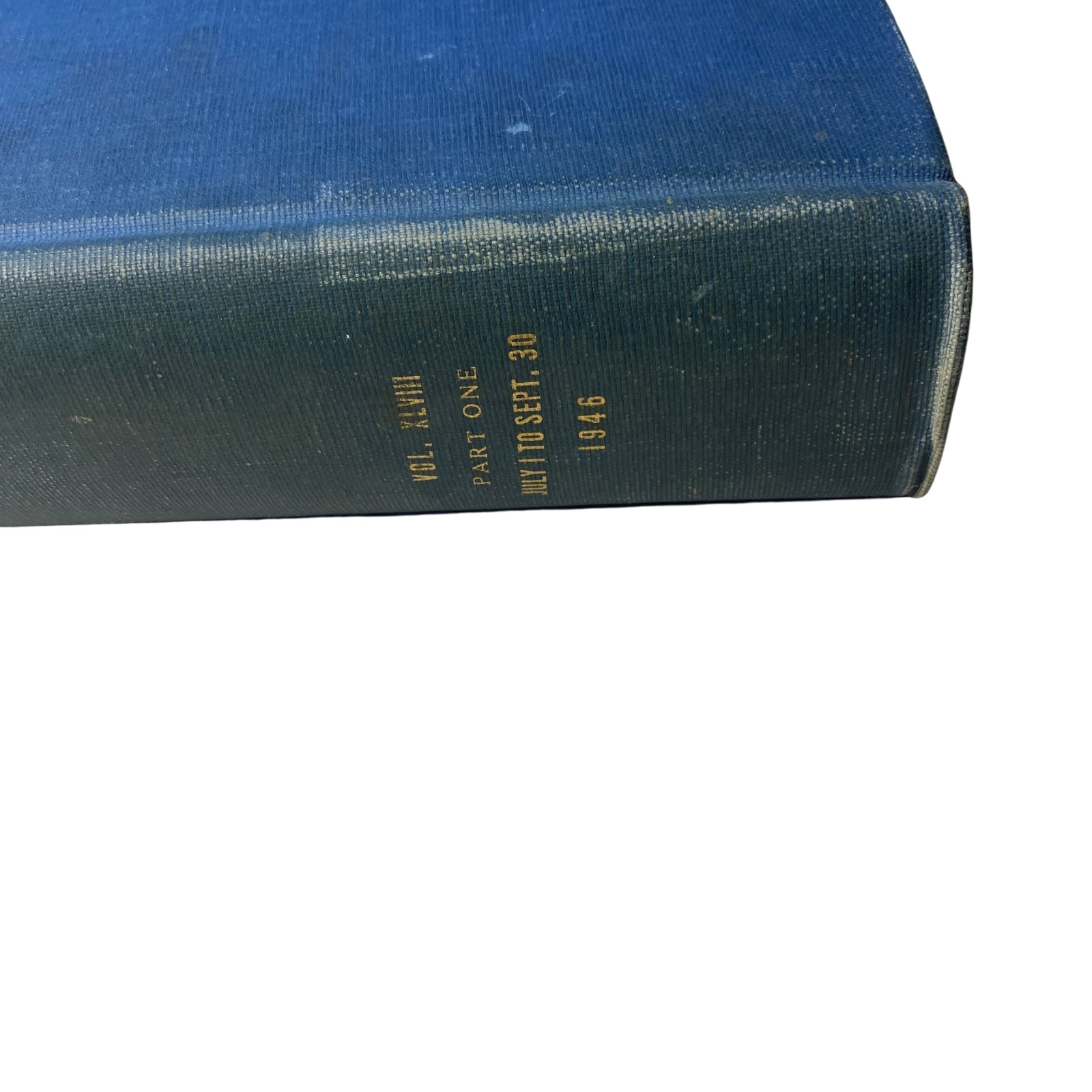 Close-up of the spine of the Library Bound Time Magazine, marking Volume XLVIII with the dates from May to September 1946.