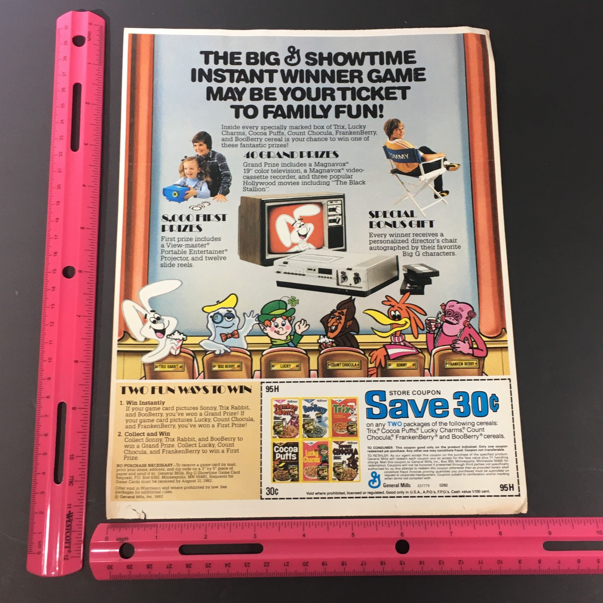 Vintage 1982 General Mills Trix, Cocoa Puffs, and Lucky Charms cereals print advertisement showcasing family fun and a chance to win games, featuring animated characters from the cereals, family activities, and a coupon to save on products.