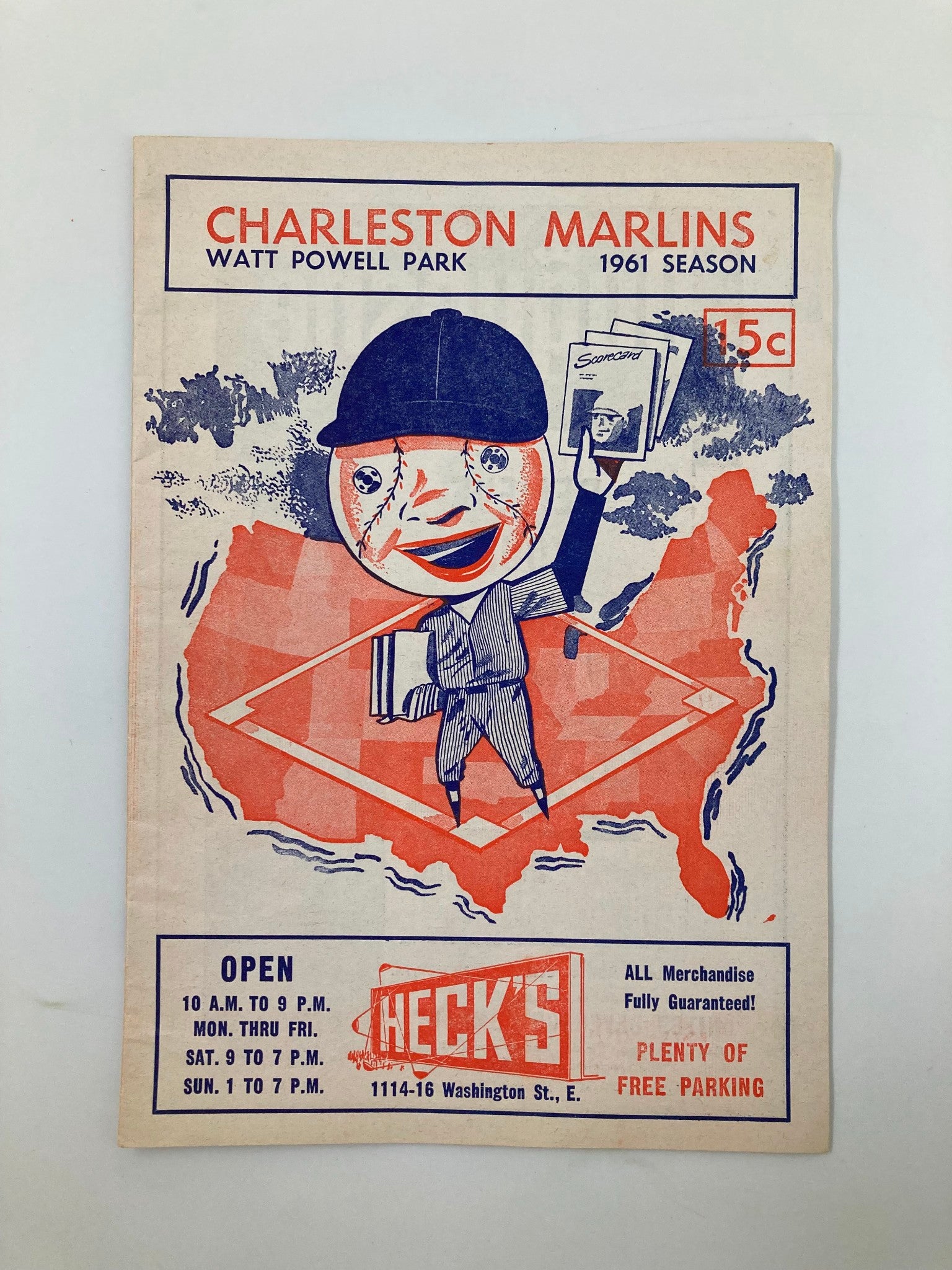 Cover of the 1961 Season Charleston Marlins Watt Powell Park Official Score Book depicting a vintage illustration of a baseball player and map.