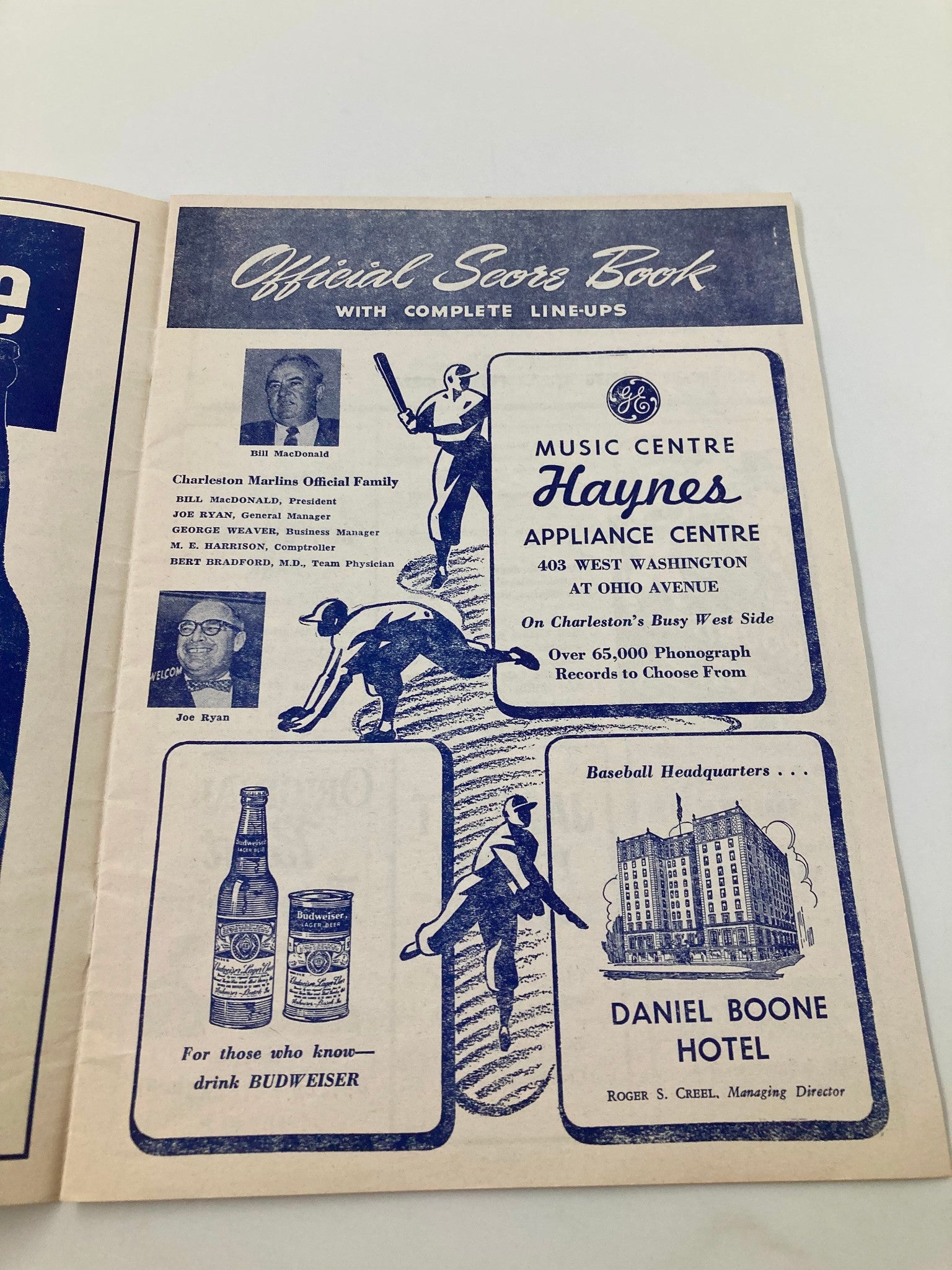 Interior page of the 1961 Season Charleston Marlins Watt Powell Park Official Score Book featuring official lineups and advertisements from the era.