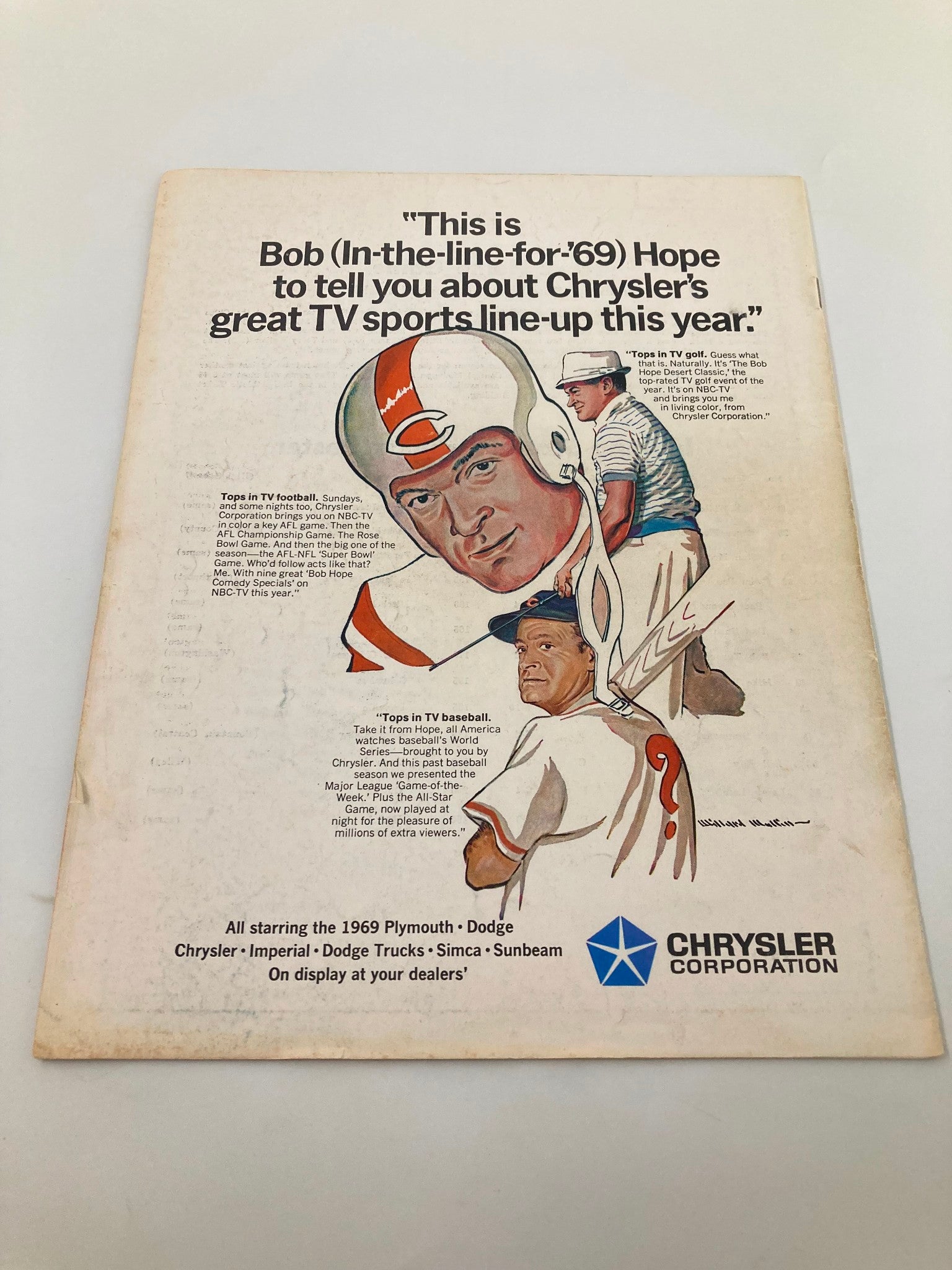 Back cover advertisement for Chrysler's 1969 TV sports lineup, featuring an illustrated character named Bob, promoting major sports events and Chrysler vehicles.