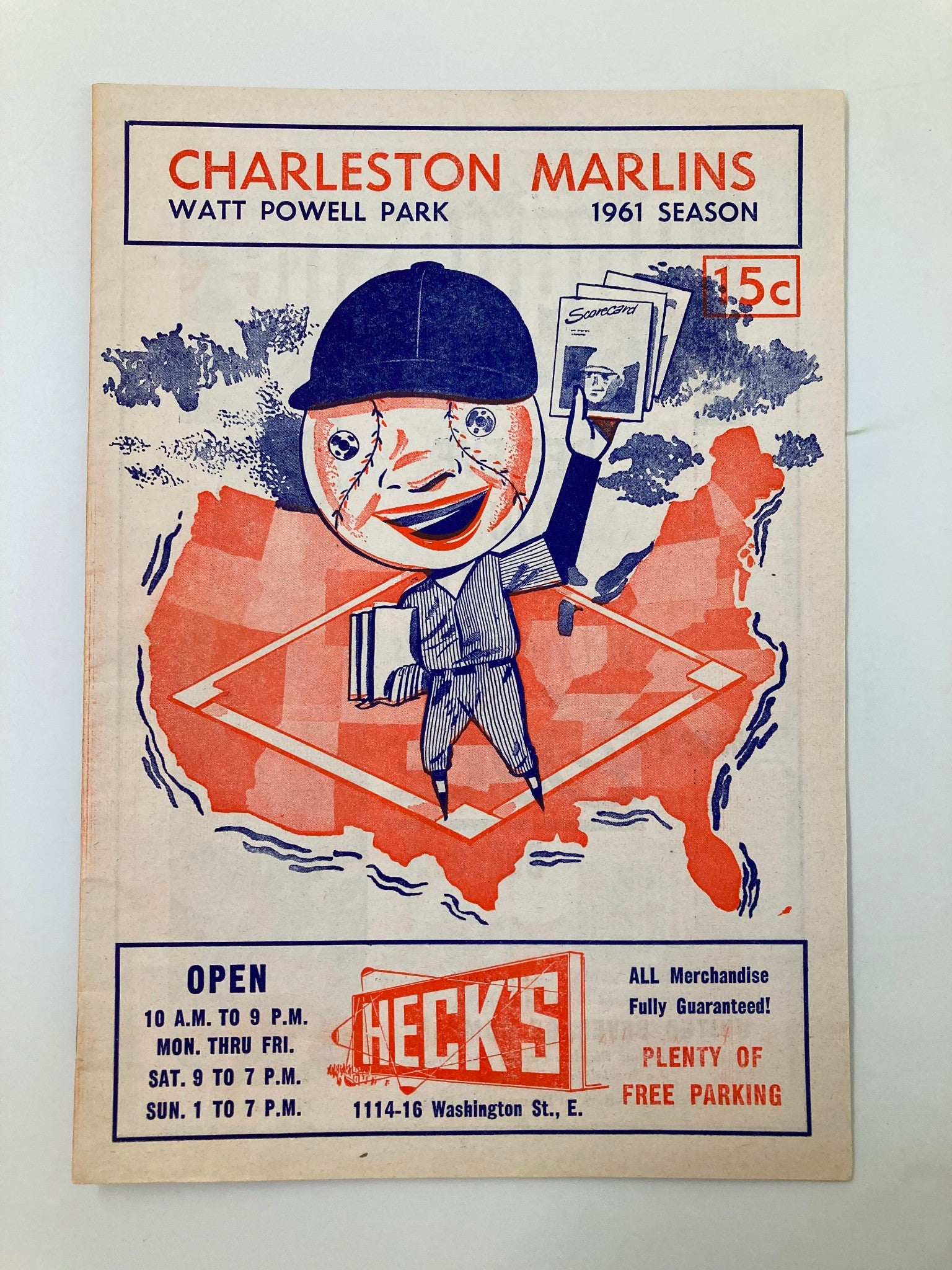 Cover of the 1961 Charleston Marlins Watt Powell Park Official Score Book featuring a cartoon character holding score sheets, with a vintage design and advertising details.
