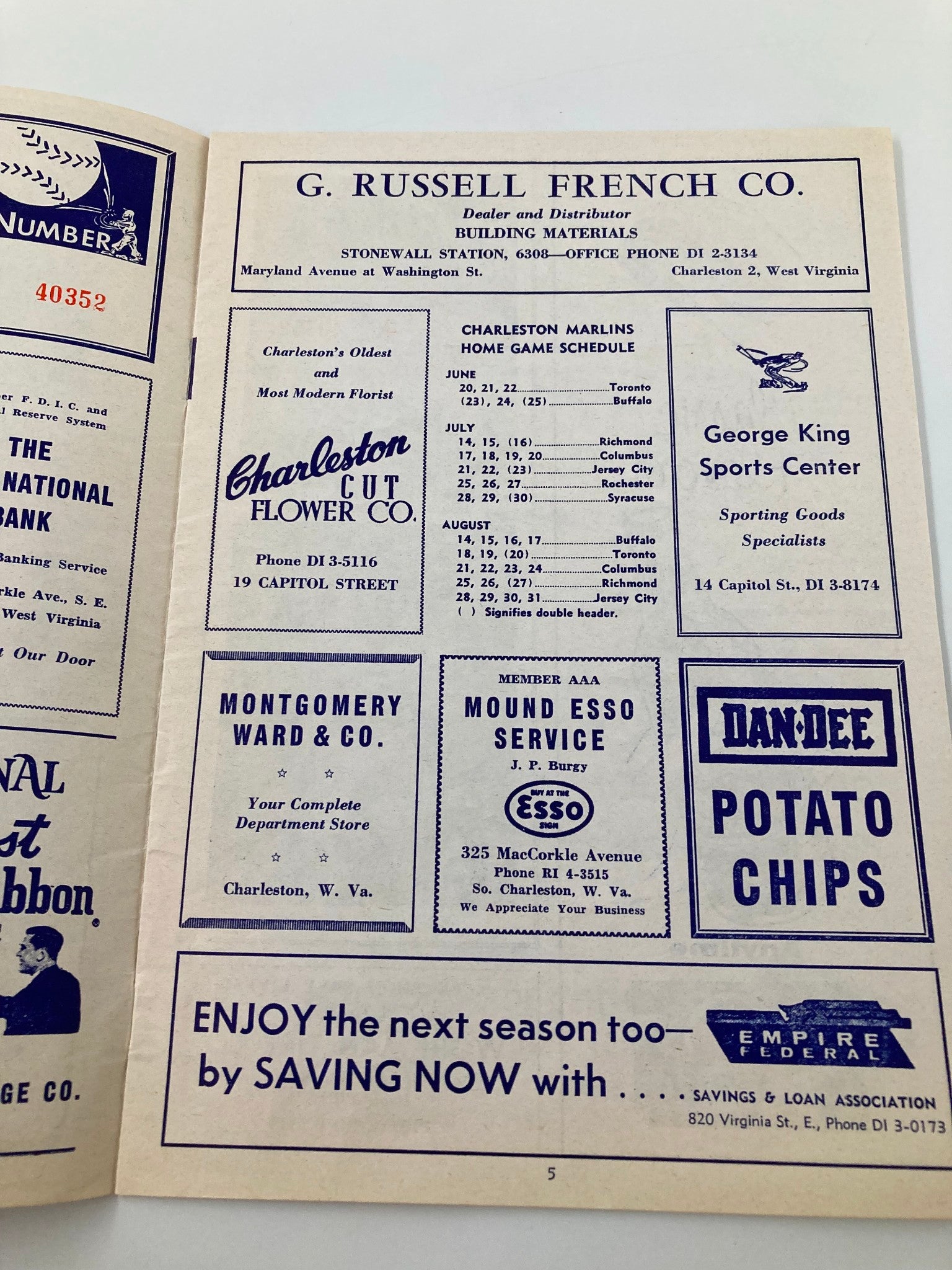 Another interior page of the 1961 Charleston Marlins Watt Powell Park Official Score Book displaying game schedule and further advertisements from local businesses.