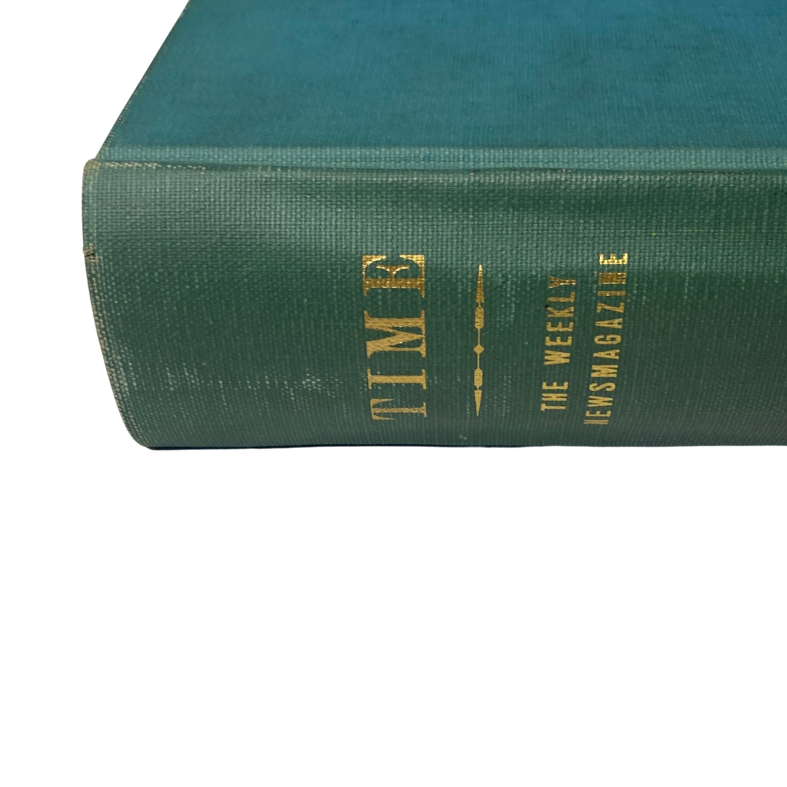 Detailed view of the spine of Time Magazine Library Bound Weekly, highlighting the year 1949 and the magazine title.