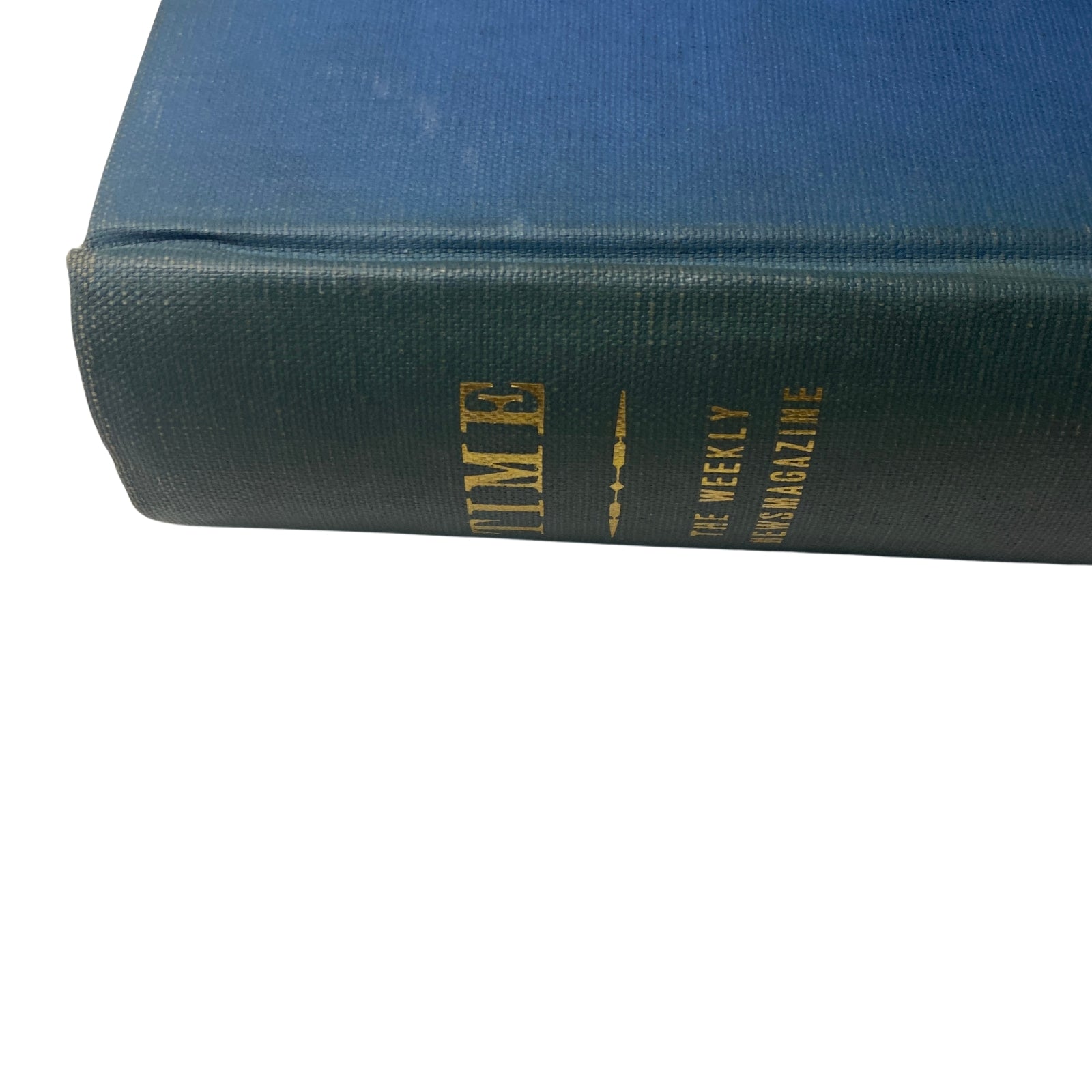 Side view of the Time Library Bound Weekly Magazine, covering issues from October 3 to December 26, 1949, featuring gold embossed lettering on a dark blue background, representing a classic collectible.