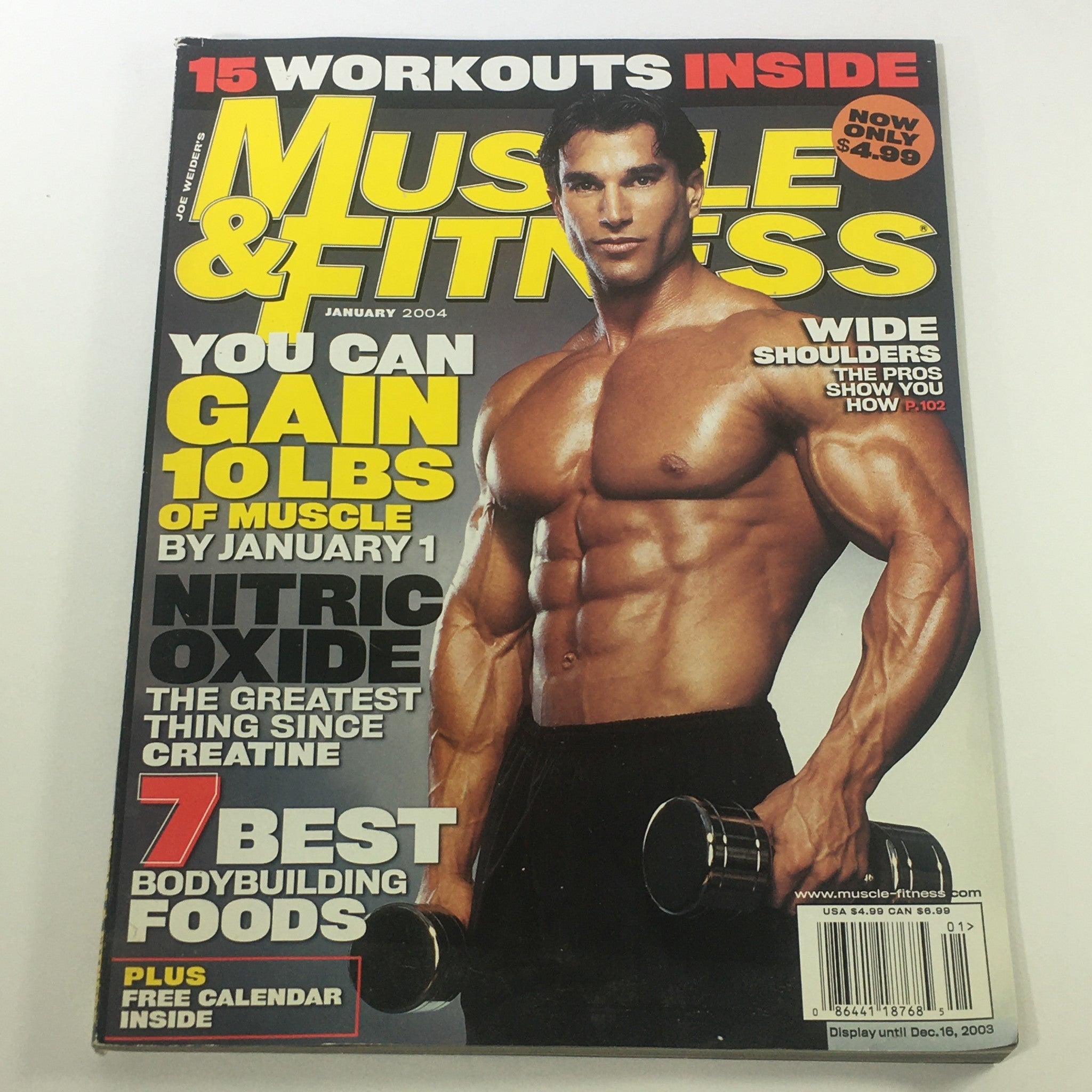 Cover of Joe Weider's Muscle & Fitness Magazine January 2004 featuring a muscular man showcasing fitness and bodybuilding with the highlighted phrases 'You Can Gain 10lbs of Muscle by January 1' and '15 Workouts Inside'.