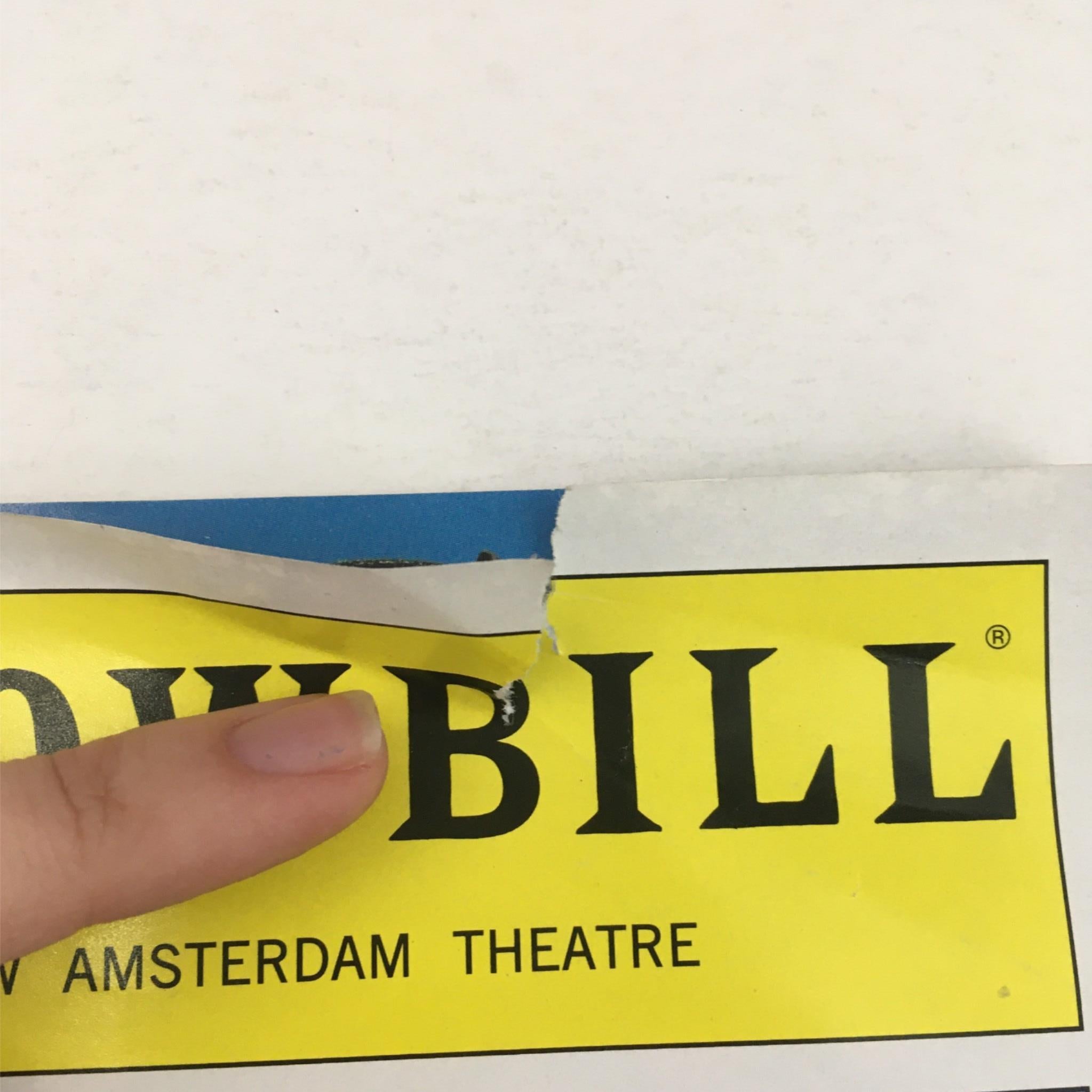 Damage detail on the cover of the 2010 Showbill for Mary Poppins by Cameron Mackintosh at New Amsterdam Theatre, showing wear on the item.