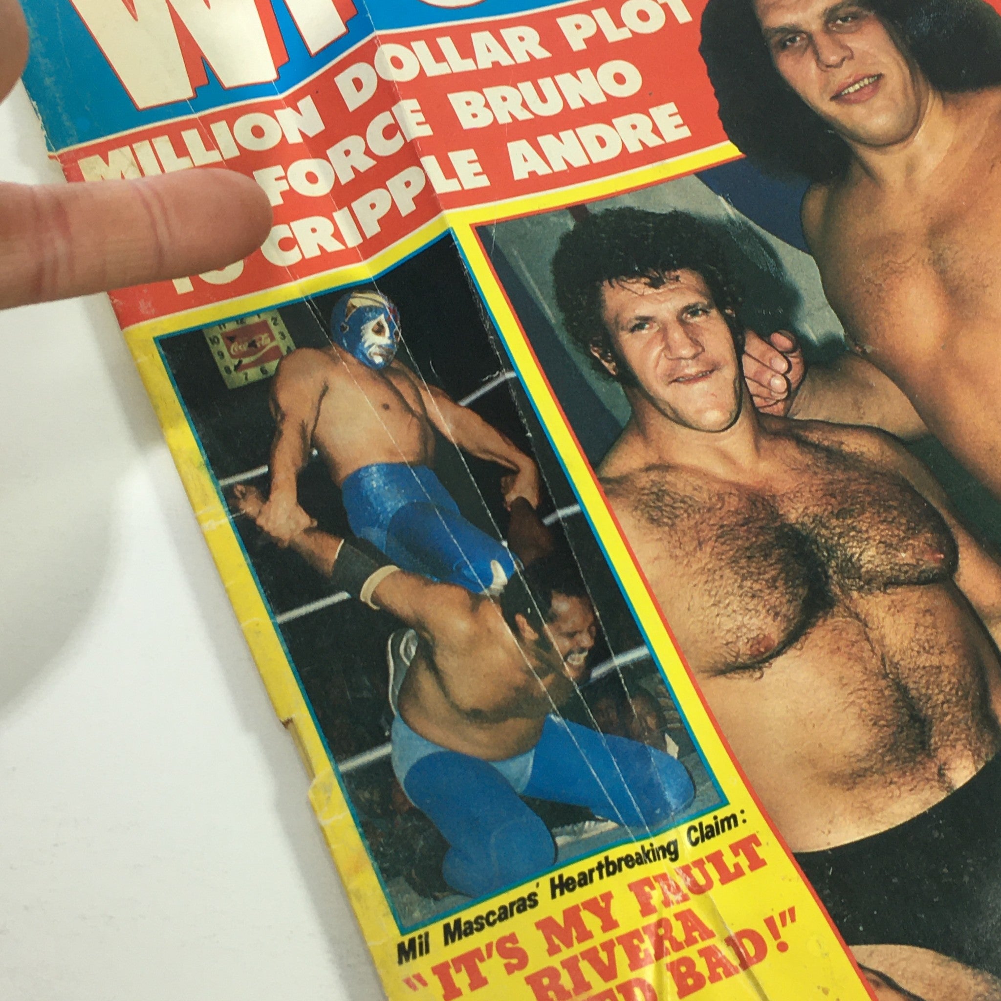 Close-up view of the cover of VTG The Wrestler Magazine May 1980 showcasing Bruno Sammartino and André the Giant, highlighting wrestling action and intriguing headlines.