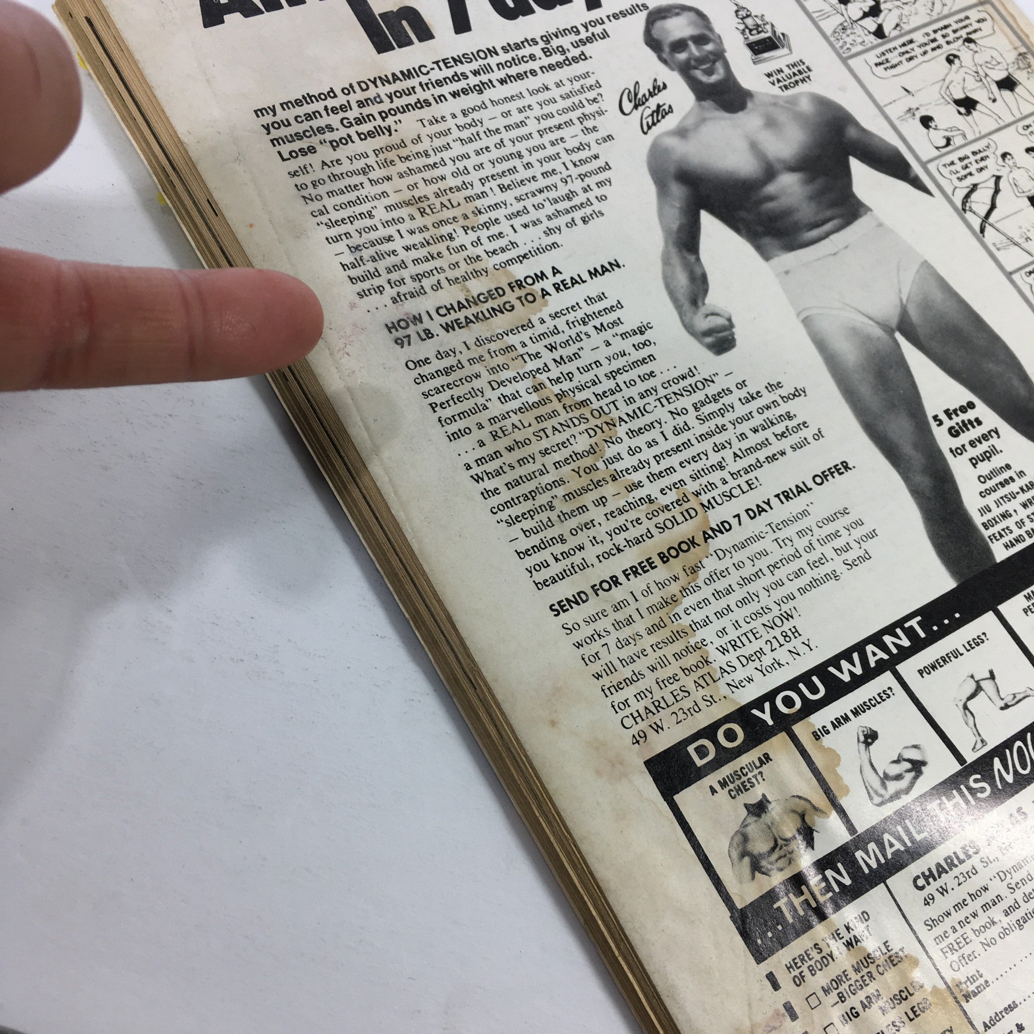 Interior page of VTG The Wrestler Magazine August 1977, showcasing an advertisement related to fitness, with a finger pointing to text, emphasizing the vintage aspect of the magazine.
