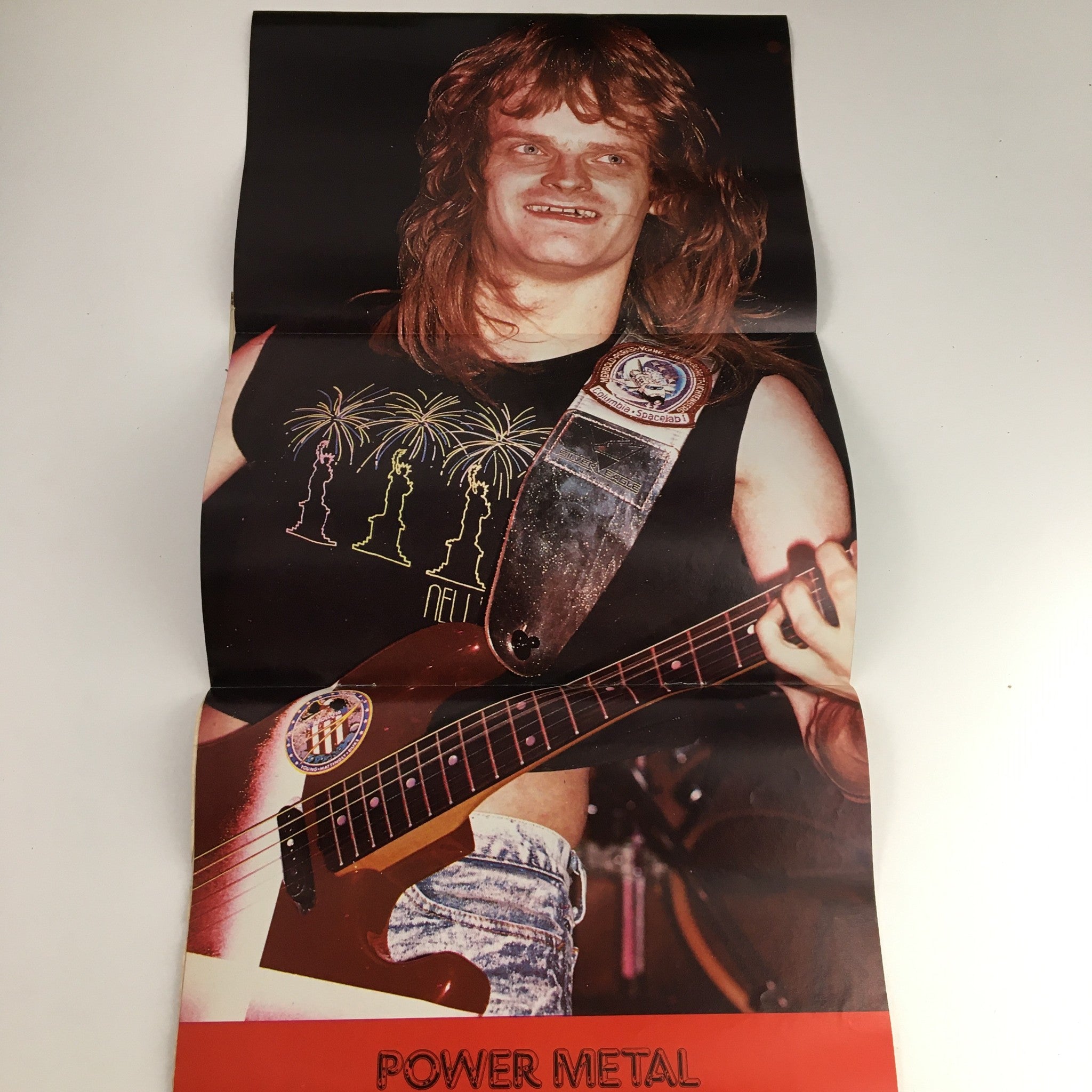Image from Hit Parader Power Metal June 1989 featuring a guitarist with long hair and a vibrant performance shirt, included in the issue with Metallica on tour.