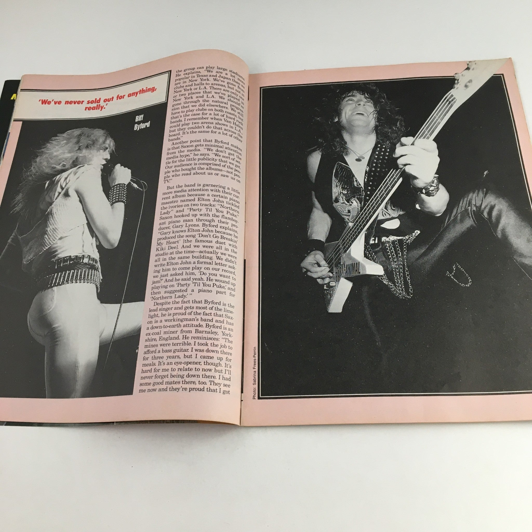 Inside view of Metal Mania Magazine October 1987, highlighting Bill Byford from Saxon in performance, including an article on rock music insights.