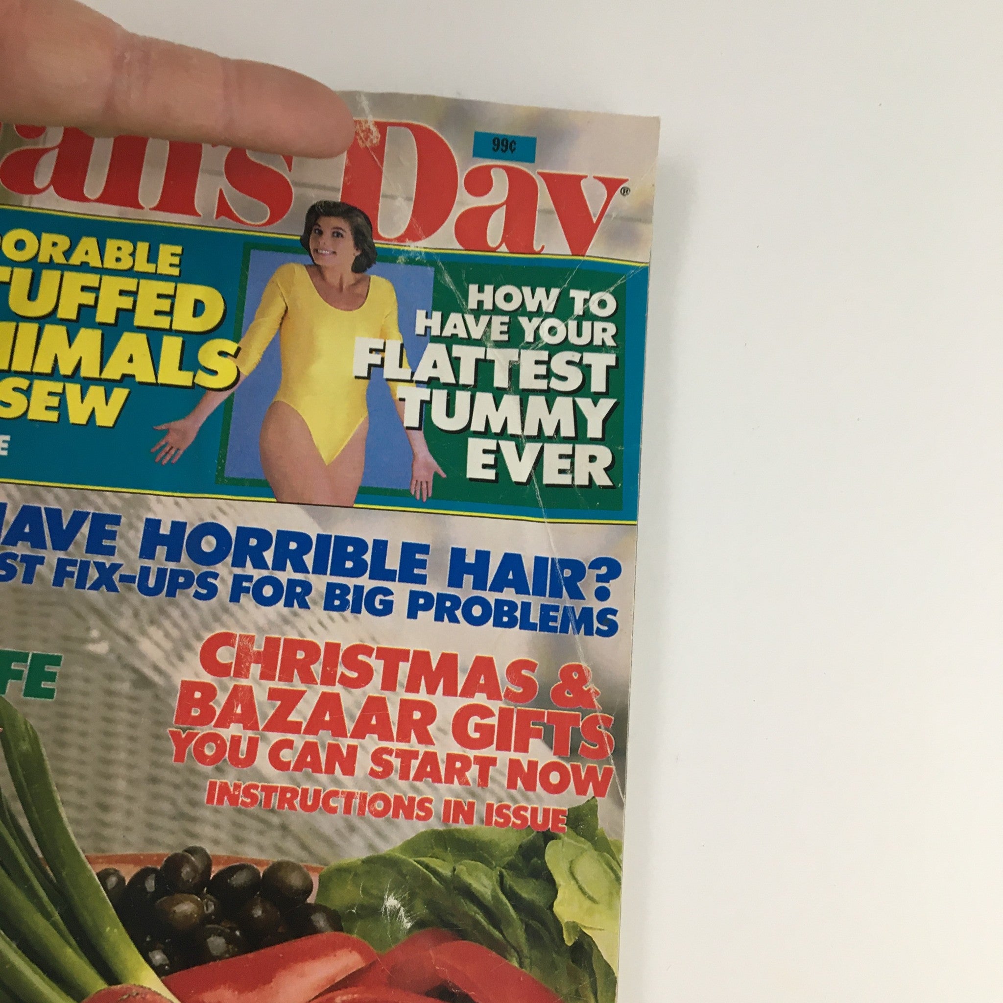 Close-up of the headline on Woman's Day Magazine August 23 1988, highlighting health tips and features like 'How to Have Your Flattest Tummy Ever'.