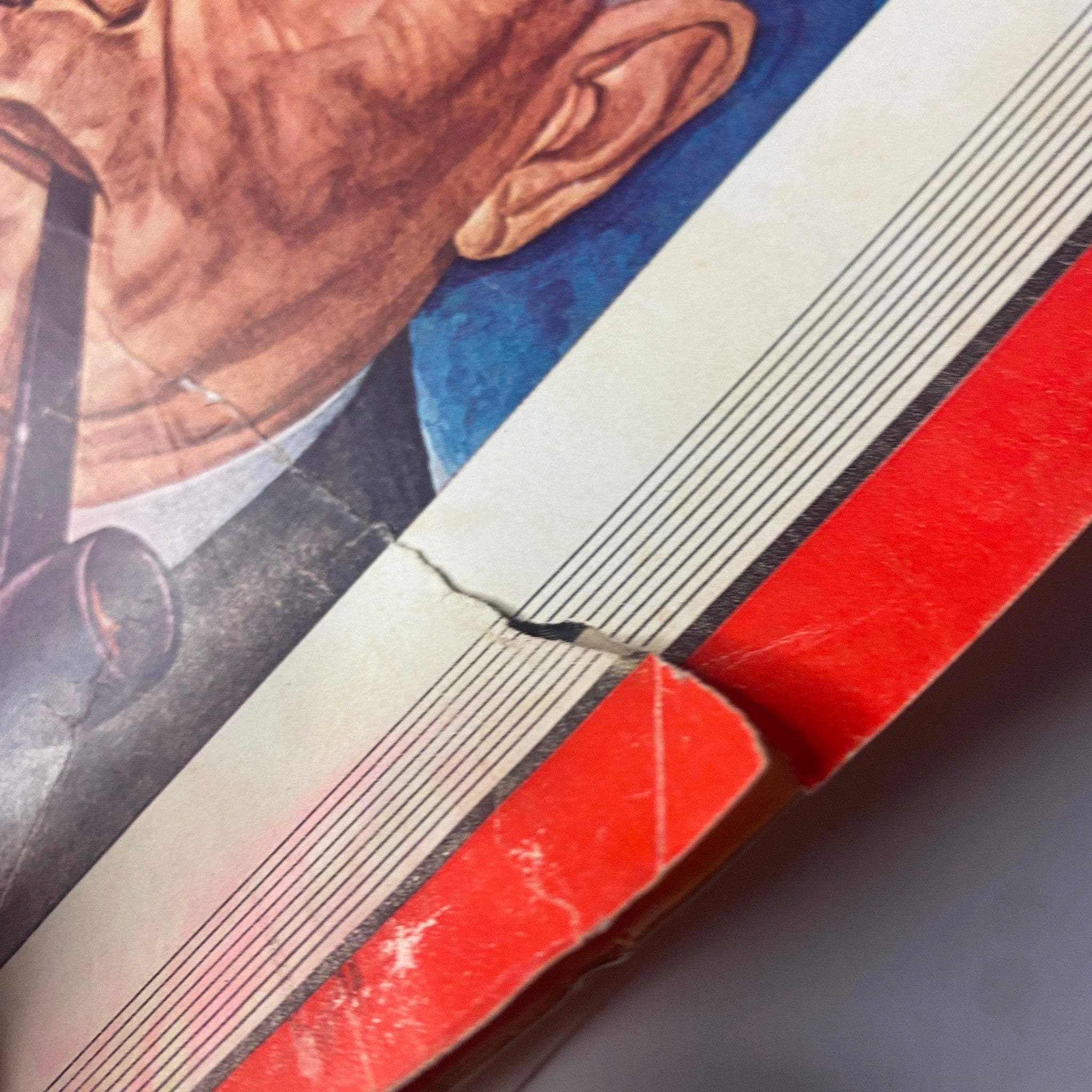 Close-up of the Time Magazine cover from February 10, 1941, highlighting imperfections such as creases and wear, emphasizing its vintage condition.