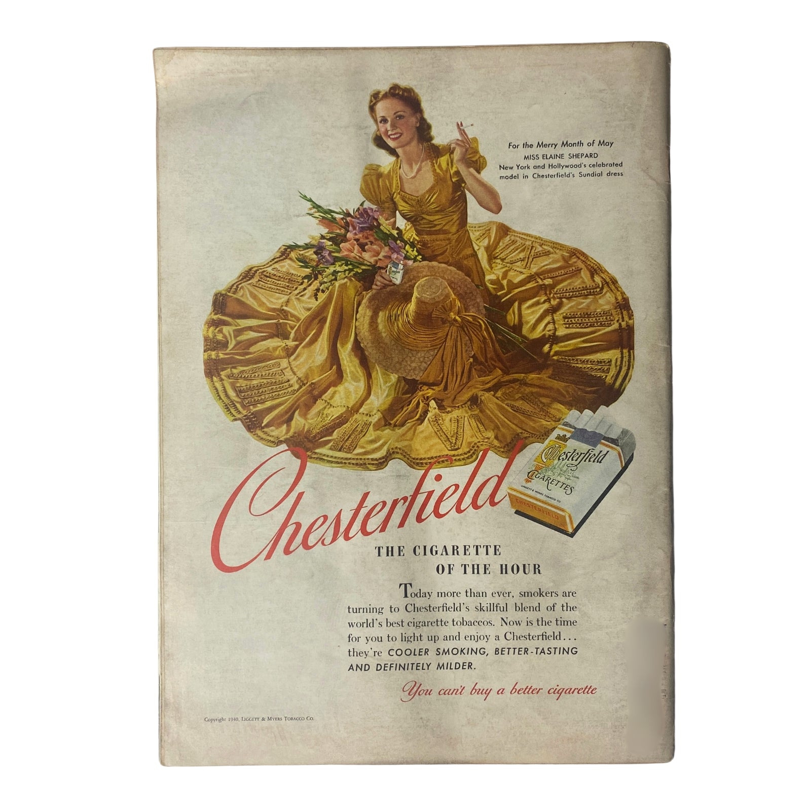 Vintage advertisement for Chesterfield cigarettes from a magazine, showcasing a model in a golden dress holding flowers, promoting Chesterfield as 'the cigarette of the hour'.