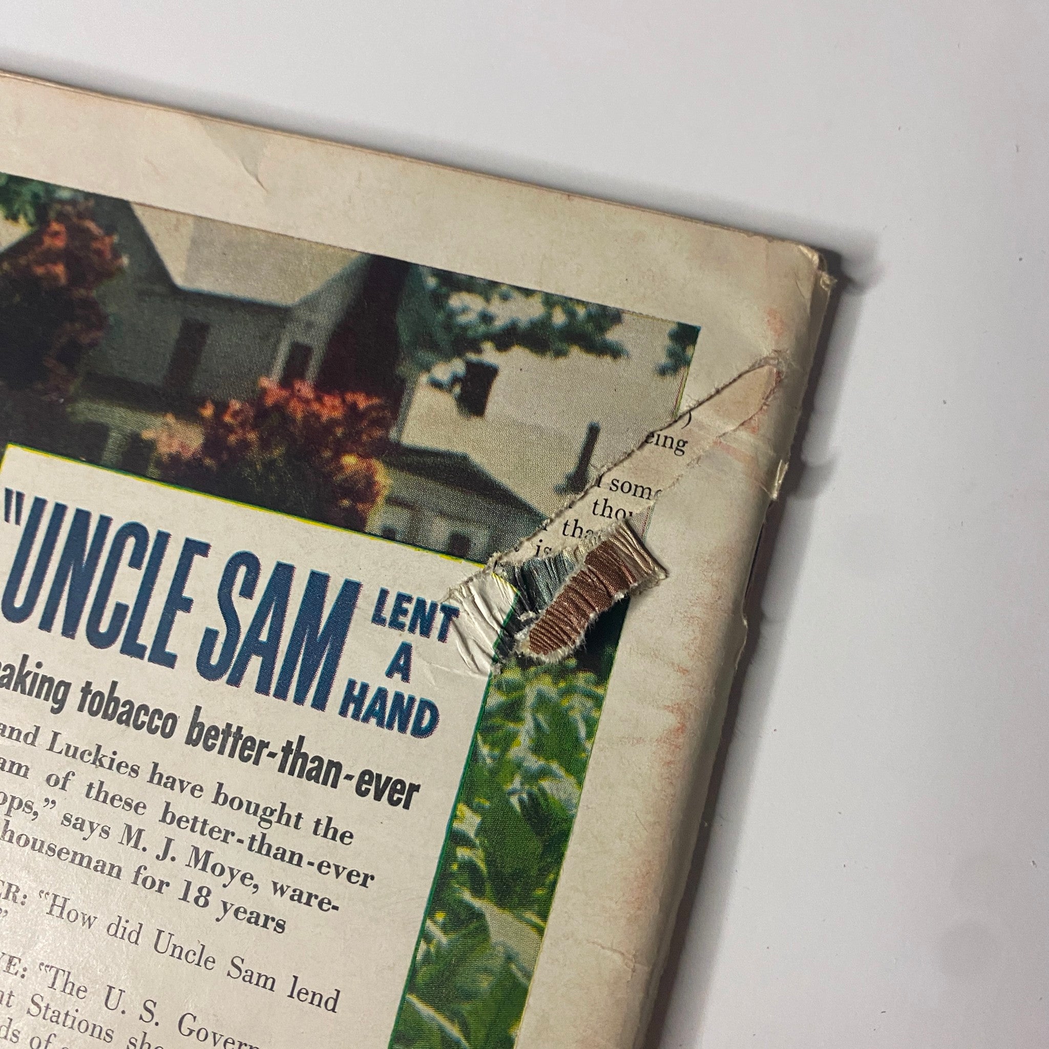 Close-up of the back cover of Time Magazine January 22, 1940, showing a detailed view of the advertisement for Lucky Strike cigarettes with visible wear.