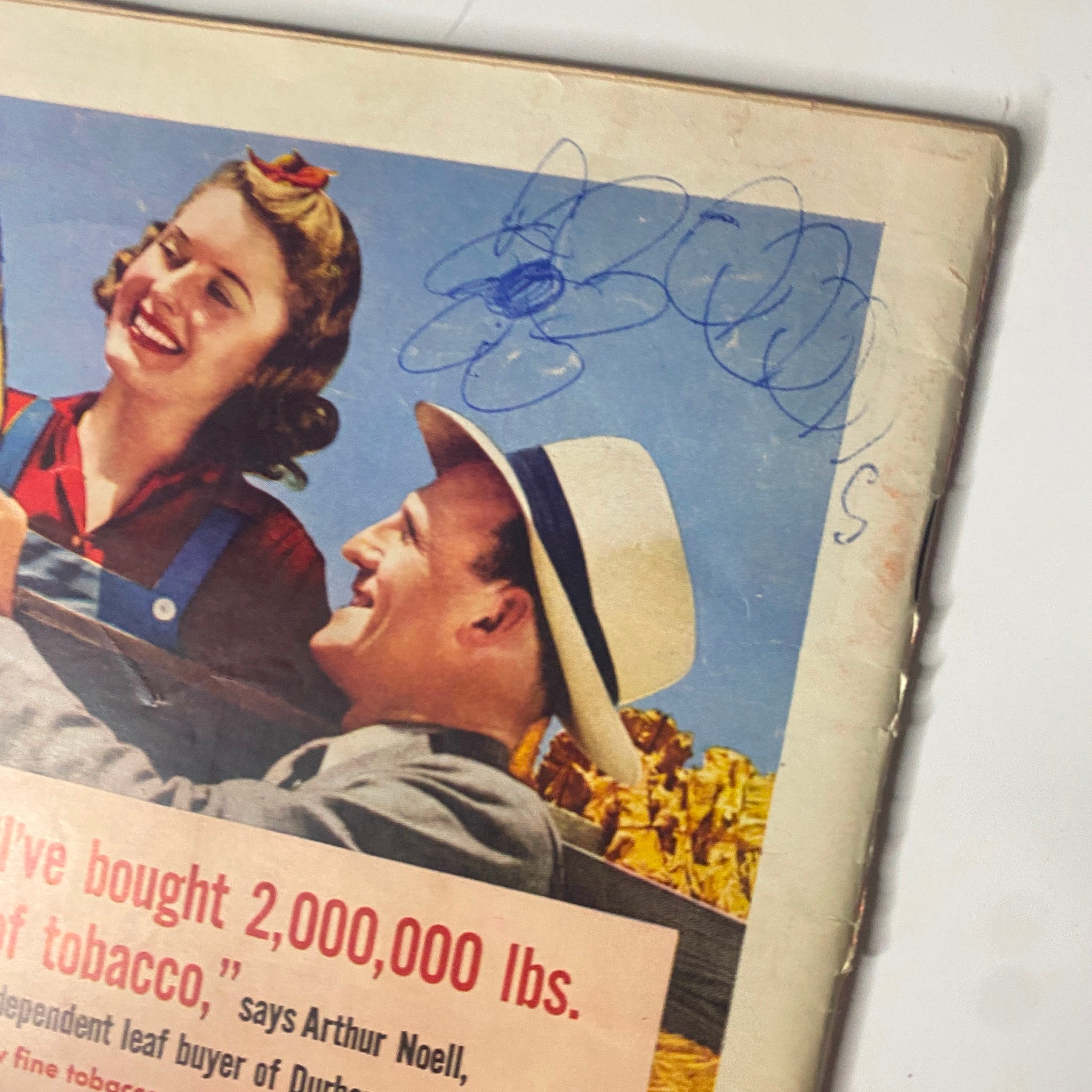 Close-up of the back cover of Time Magazine January 20, 1941 Vol 37 No. 3, focusing on a Lucky Strike cigarette advertisement with a man and woman. Includes text highlighting Arthur Noell's tobacco purchasing and expertise.