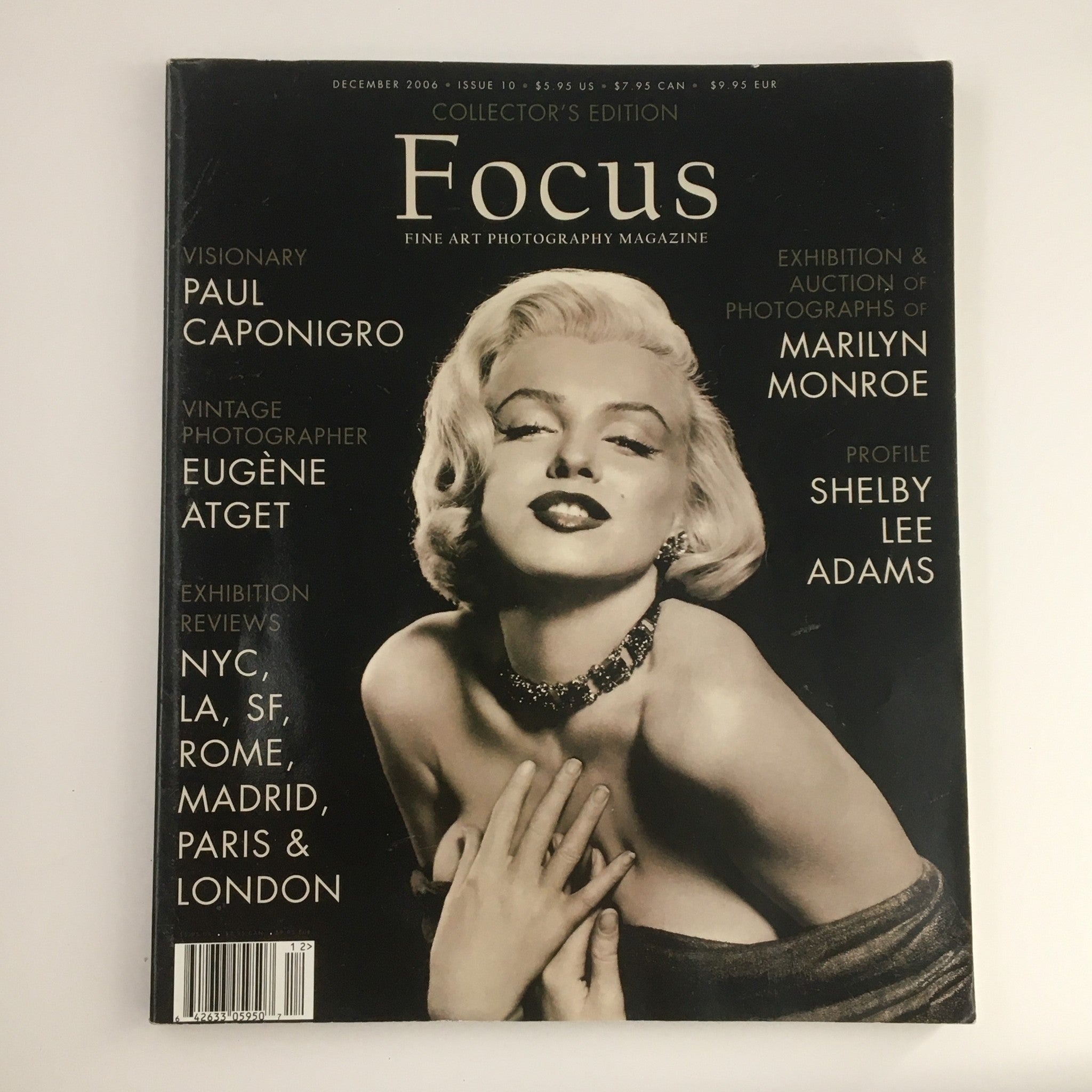 Focus Photography Magazine December 2006 cover featuring Marilyn Monroe, with a captivating black and white photo showcasing her allure and elegance.