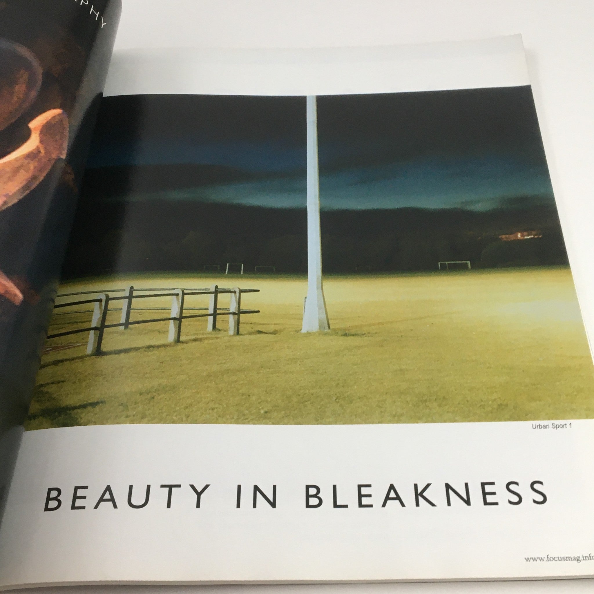 Focus Photography Magazine December 2006, showcasing an image titled 'Beauty in Bleakness' with a dramatic scene of a lonely soccer field under a dusk sky.