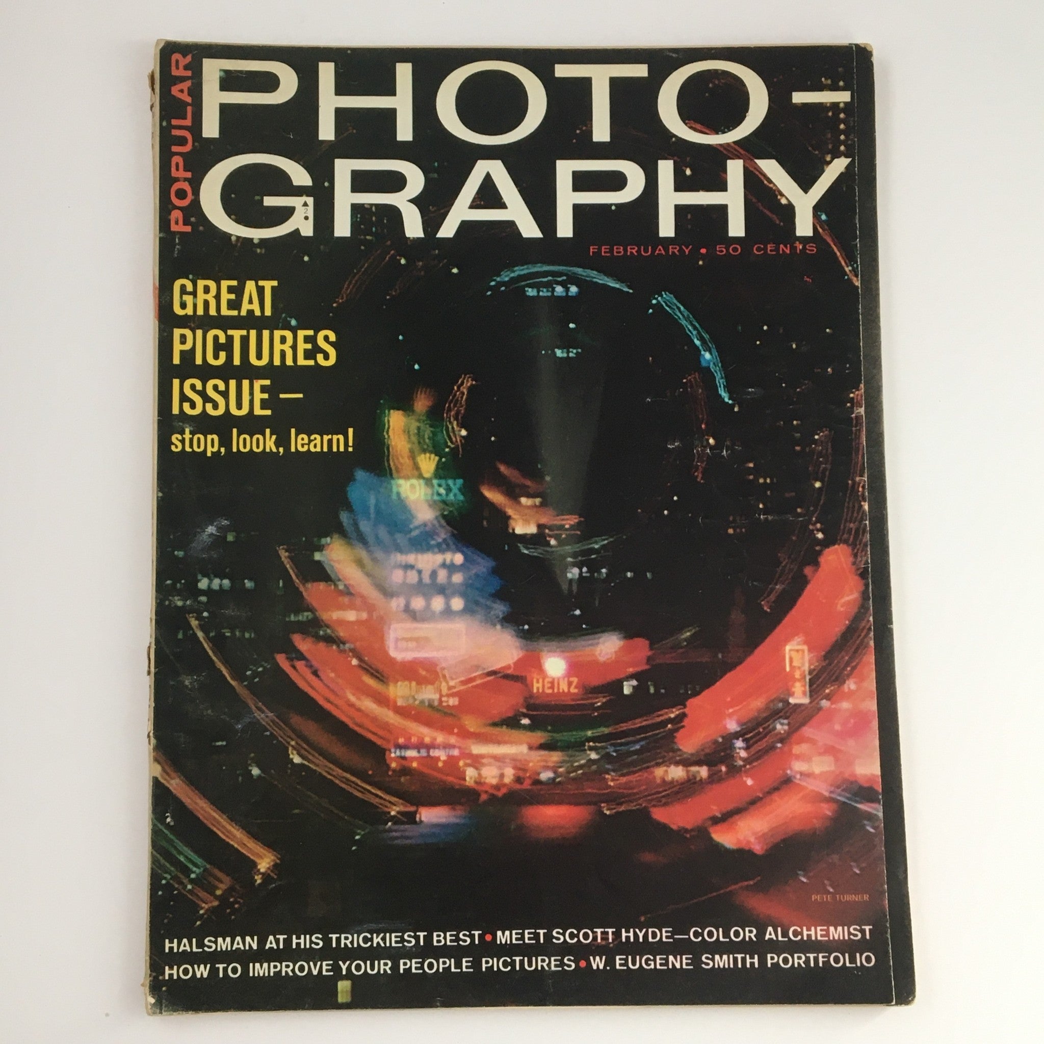 Cover of Popular Photography Magazine February 1965 featuring vibrant colors and lights, highlighting the Great Pictures Issue with an emphasis on Scott Hyde, Color Alchemist.