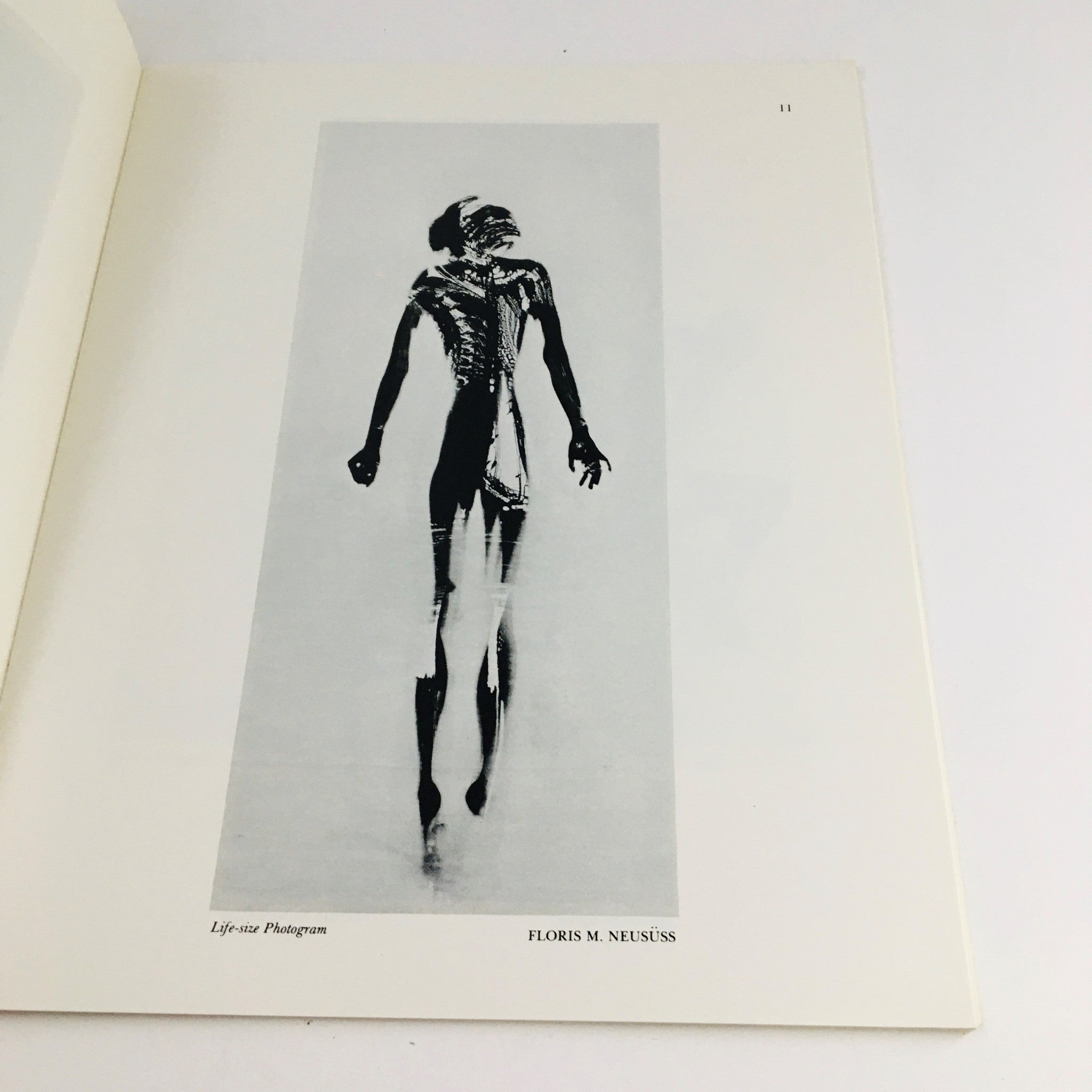 Artistic image featured in Combinations Winter 1977 Vol 1 #2 titled 'Life-size Photogram' by Floris M. Neusüss, showcasing a unique photographic technique.