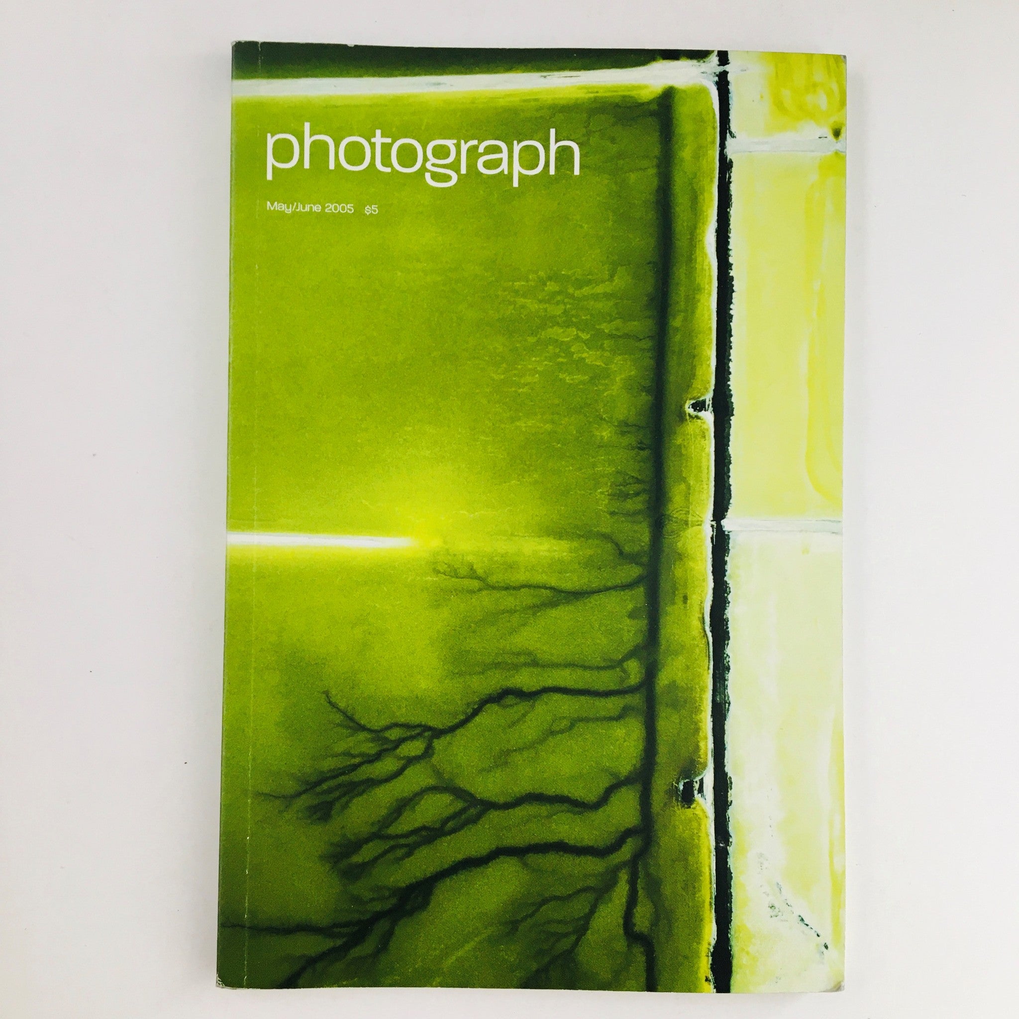 Cover of Photograph Magazine May 2005 featuring a striking green design and the title photograph.