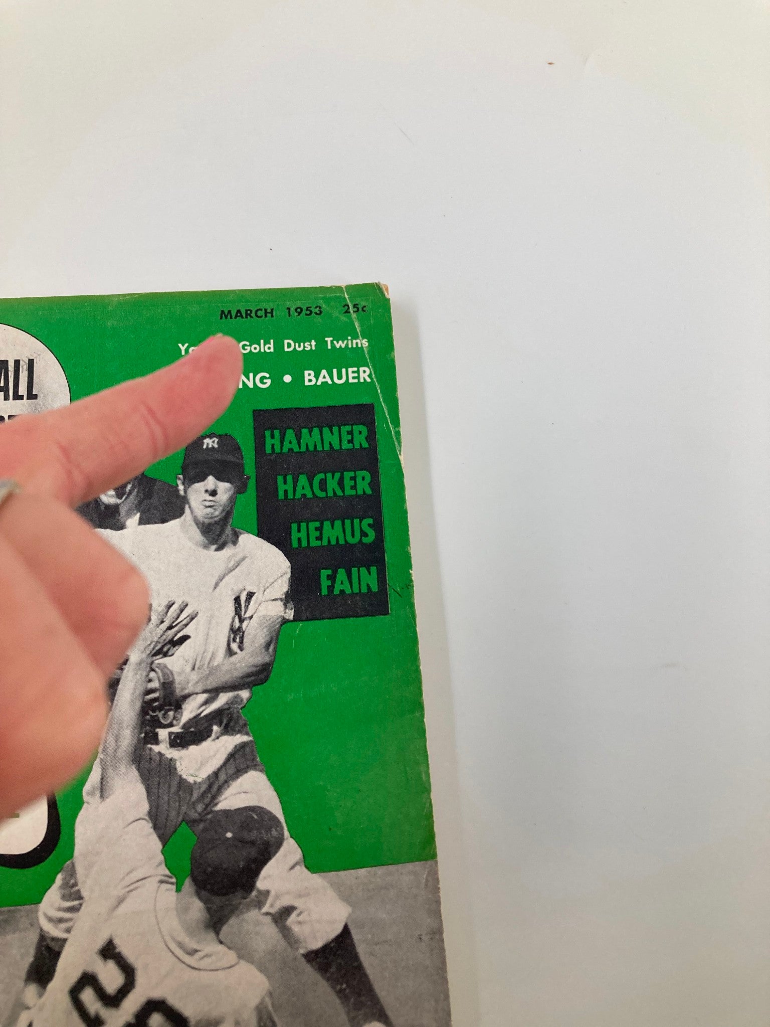 Close-up view of the Vintage Baseball Digest March 1953 cover highlighting the title and a baseball action scene with umpire and players.