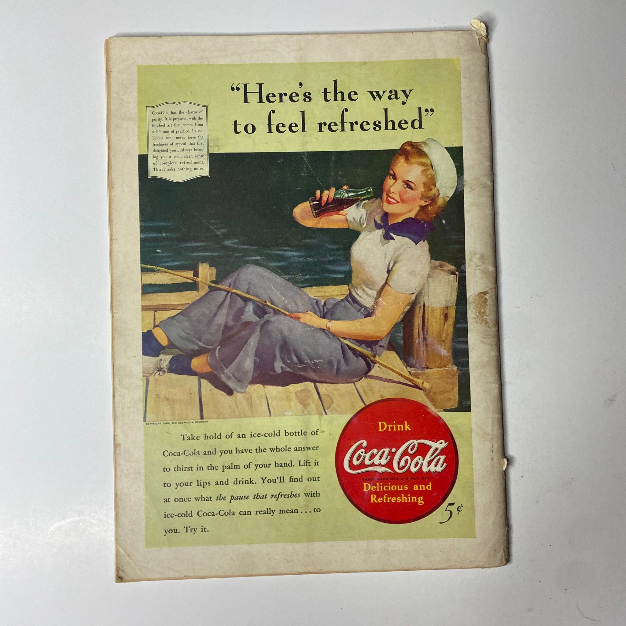 Vintage Coca-Cola advertisement featuring a smiling woman in sailor attire enjoying a Coke on a dock. The ad includes the caption 'Here's the way to feel refreshed' and promotes Coca-Cola as a delicious and refreshing drink, priced at 5 cents. This image aligns with the historic context of Time Magazine August 12, 1940, Vol 36, No. 7 featuring Getúlio Vargas.