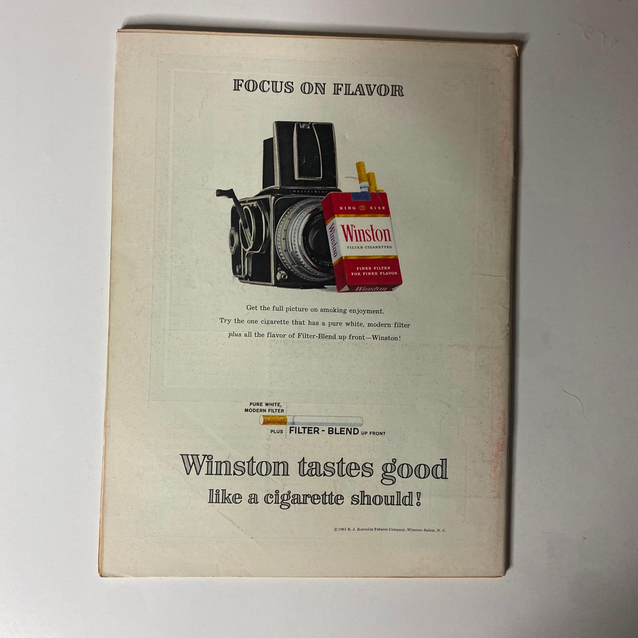 Back cover of Time Magazine May 31, 1963, featuring an advertisement for Winston cigarettes, highlighting the brand's modern filter and focus on flavor.