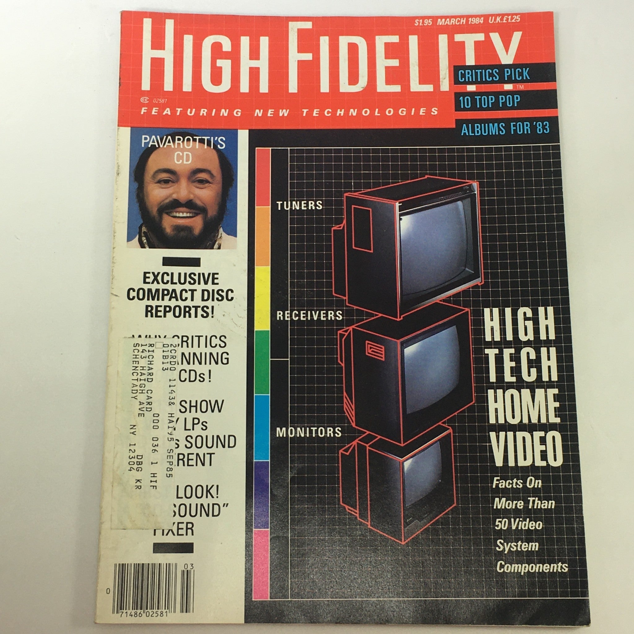Cover of High Fidelity Music Magazine March 1984 featuring a headline on high-tech home video systems, illustrations of video components such as tuners, receivers, and monitors, and an image of Pavarotti promoting his CD. This vintage magazine highlights the evolution of music and technology.