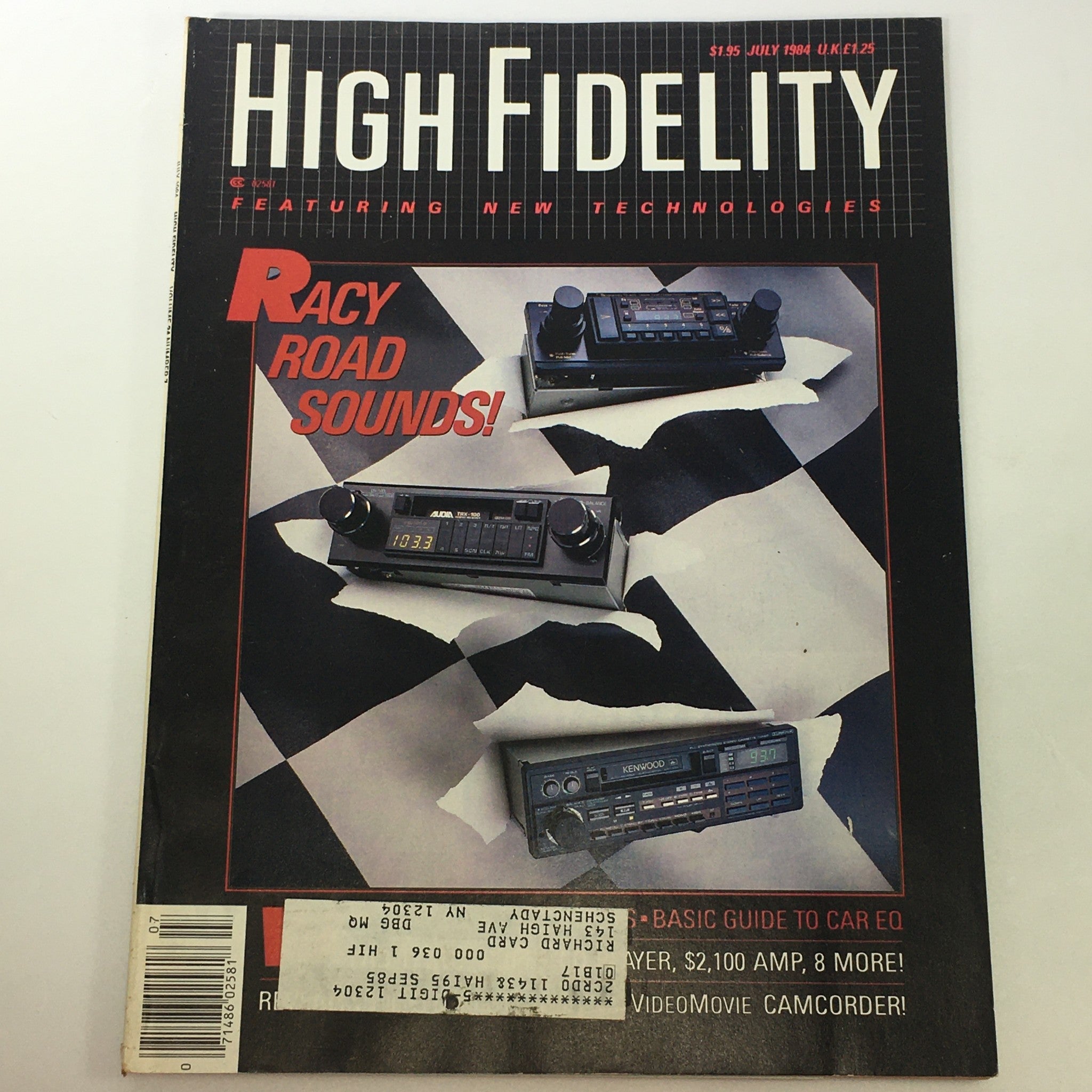 Cover of VTG High Fidelity Music Magazine July 1984 featuring Racy Road Sounds and new technologies in music, showcasing car audio equipment on a checkered background.