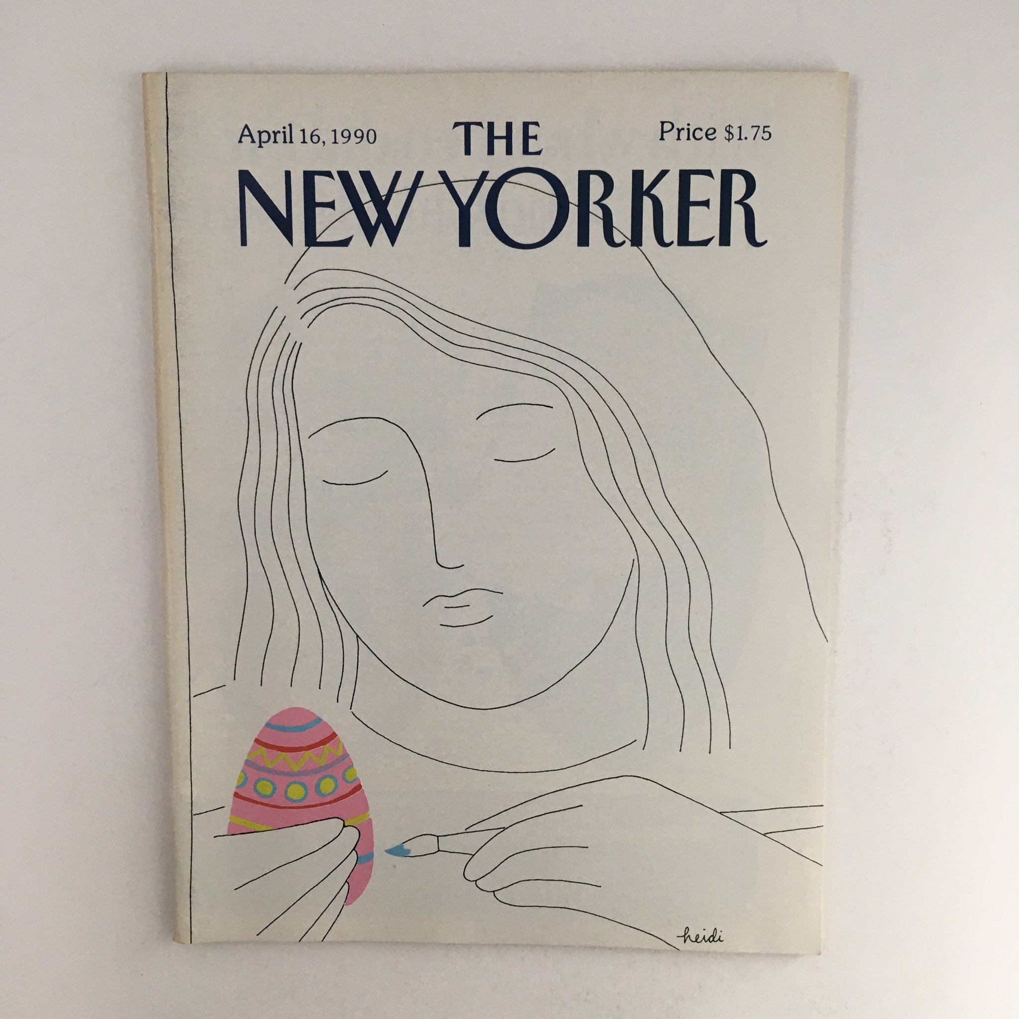 The New Yorker April 16, 1990 magazine cover art featuring a serene illustration of a woman painting a decorative Easter egg, designed by Heidi Goennel, showcasing the issue's elegant aesthetic and vintage charm.