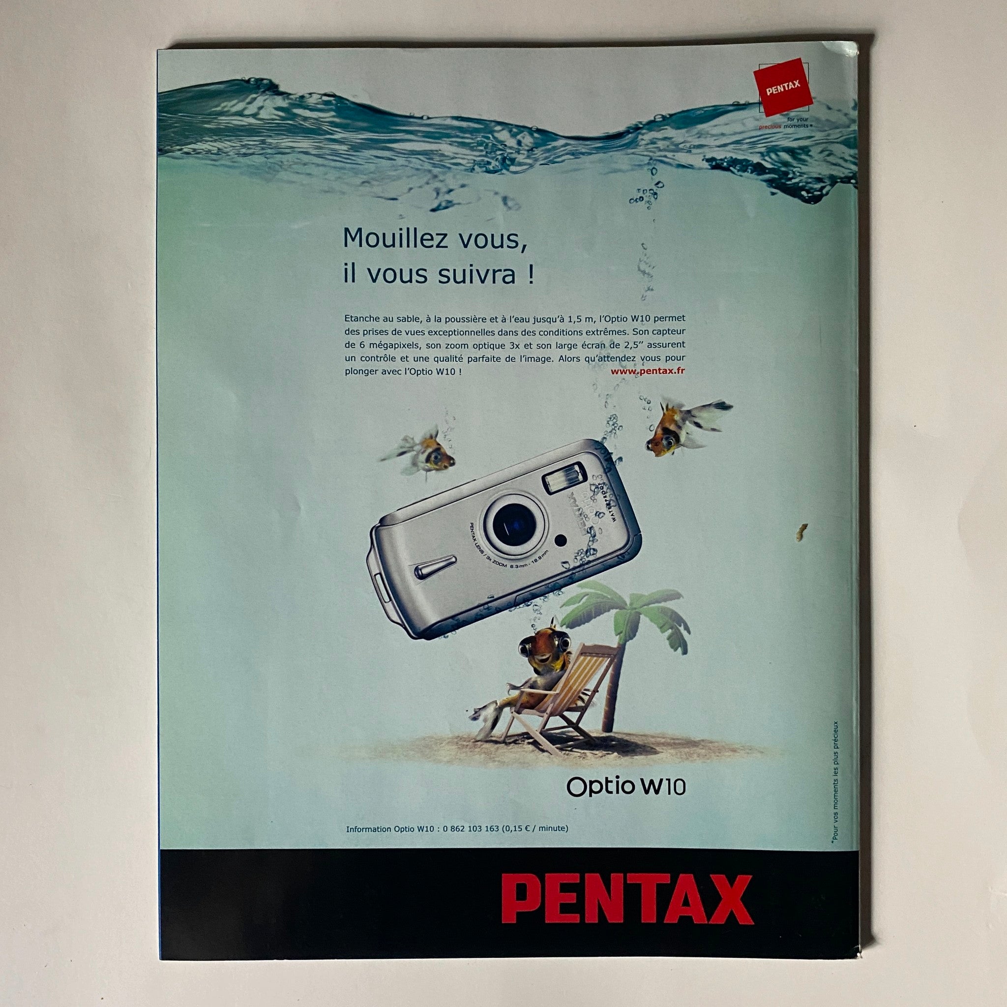 Photo France July 2006 No. 431 Adriana Lima & Ellen von Unwerth No Label VG, showcasing an advertisement for the Pentax Optio W10 camera, highlighting its waterproof capabilities with a playful underwater theme.