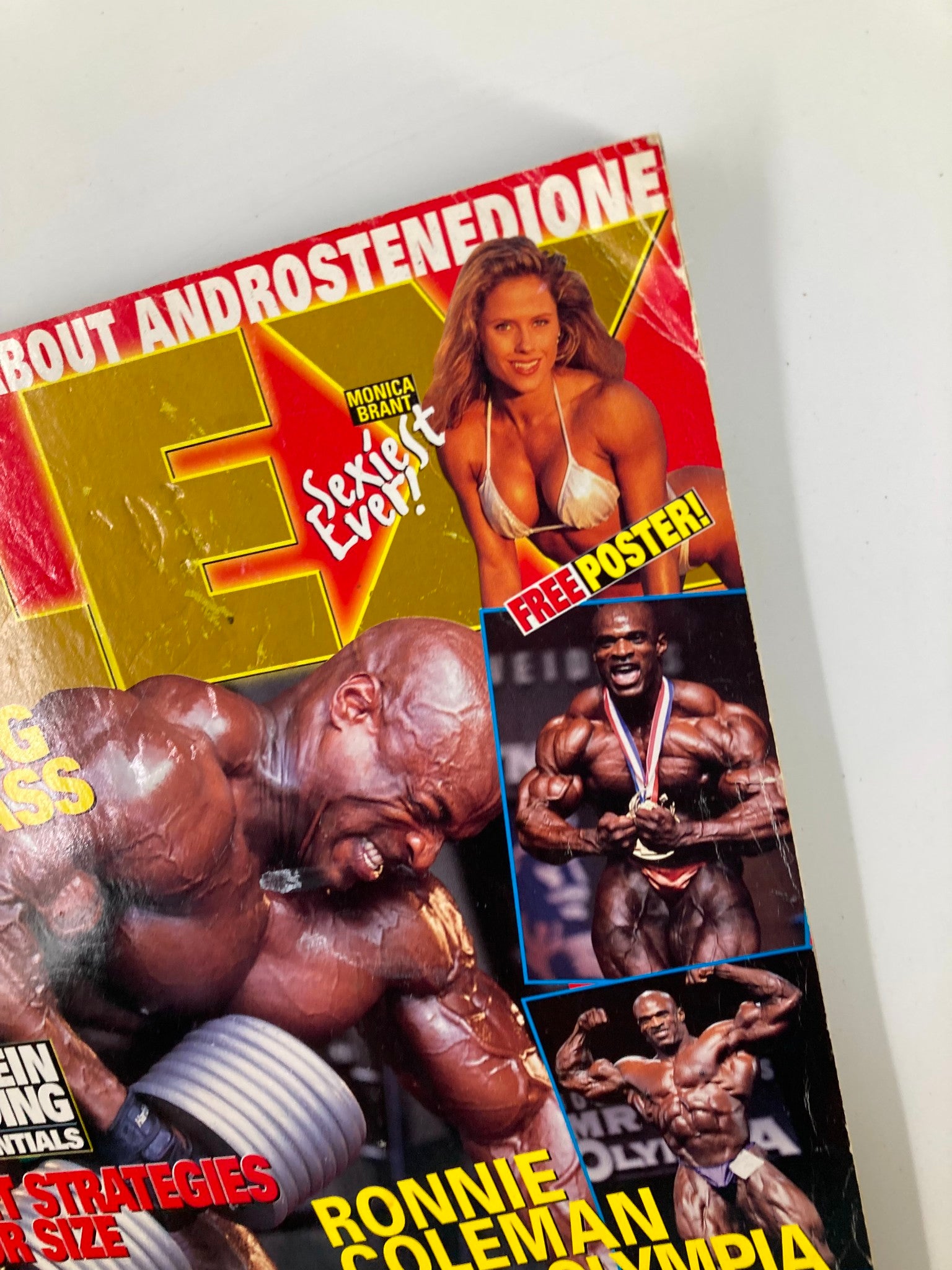 Close-up of Joe Weider's Flex Magazine January 1999 cover highlighting Ronnie Coleman and Monica Brant, emphasizing fitness articles and a free poster.