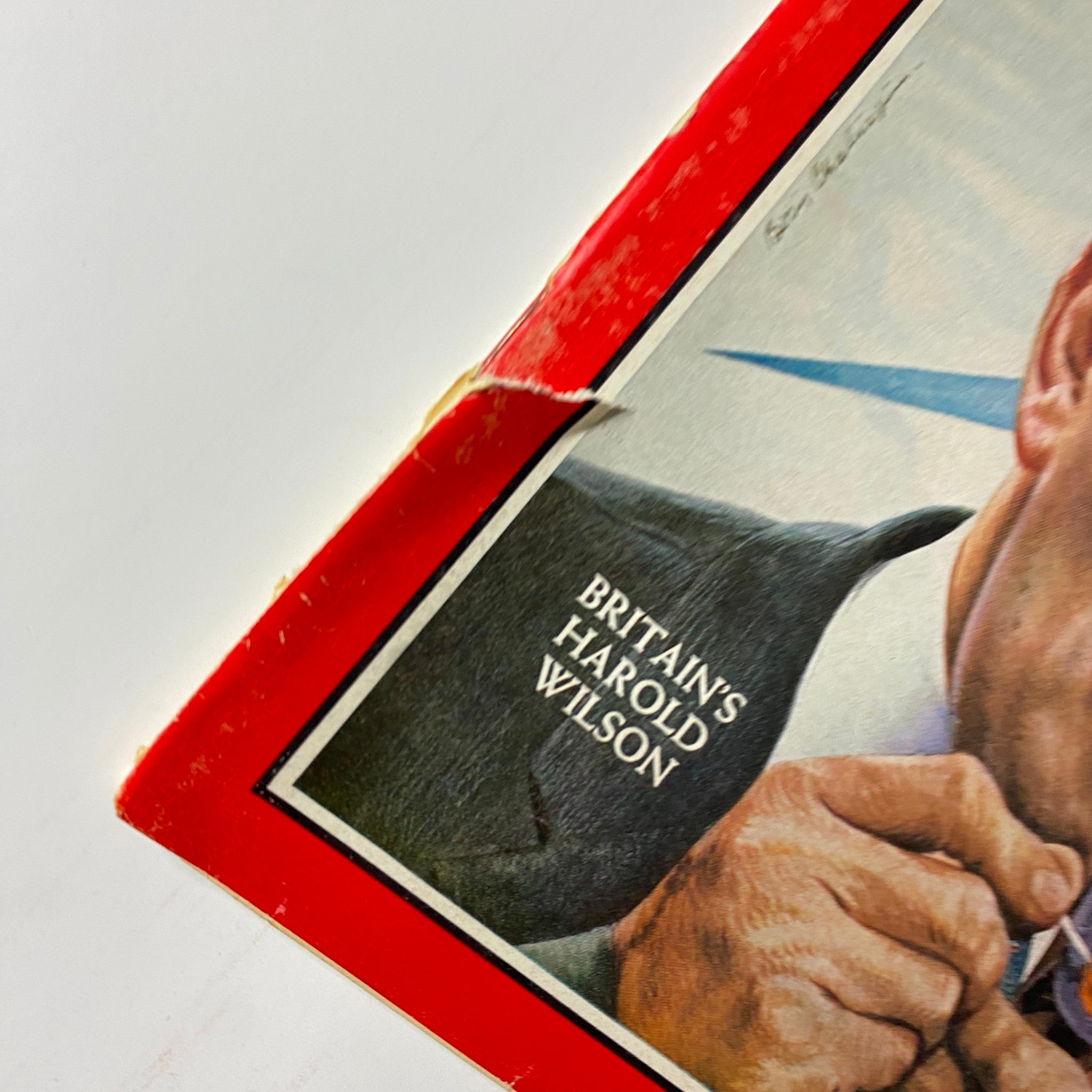Close-up of Time Magazine October 11, 1963 cover highlighting British Labour leader Harold Wilson, emphasizing his name and the intricate details of the illustration.