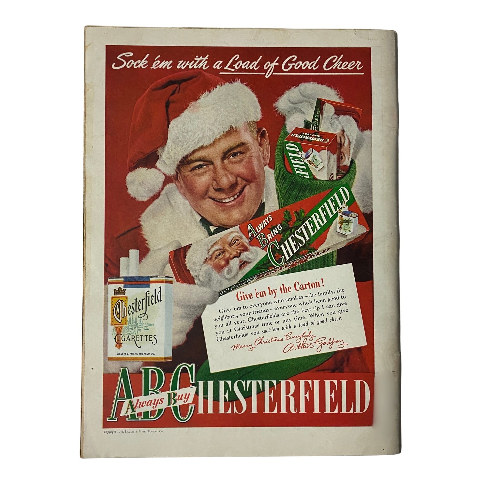 Vintage advertisement page from Time Magazine, presenting Chesterfield cigarettes with a cheerful Santa Claus promoting their holiday offerings.