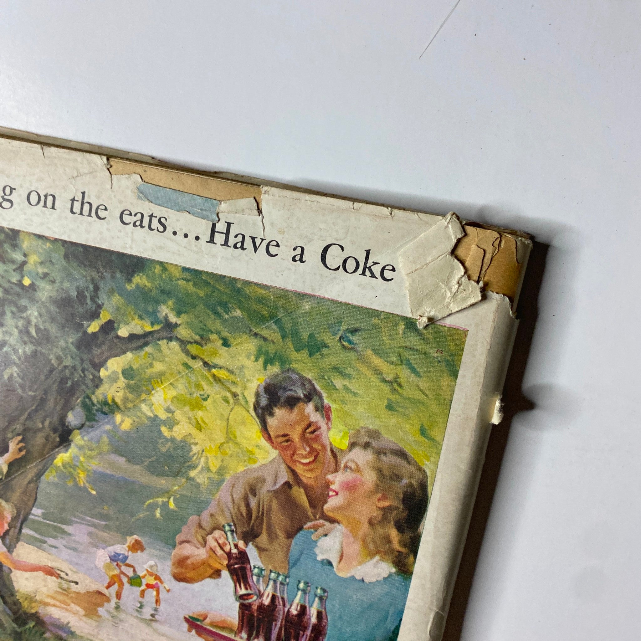 Close-up of Time Magazine June 3, 1946 Vol 47 No. 22 cover showing a couple smiling and holding bottles of Coca-Cola during a picnic, illustrating a friendly gathering.