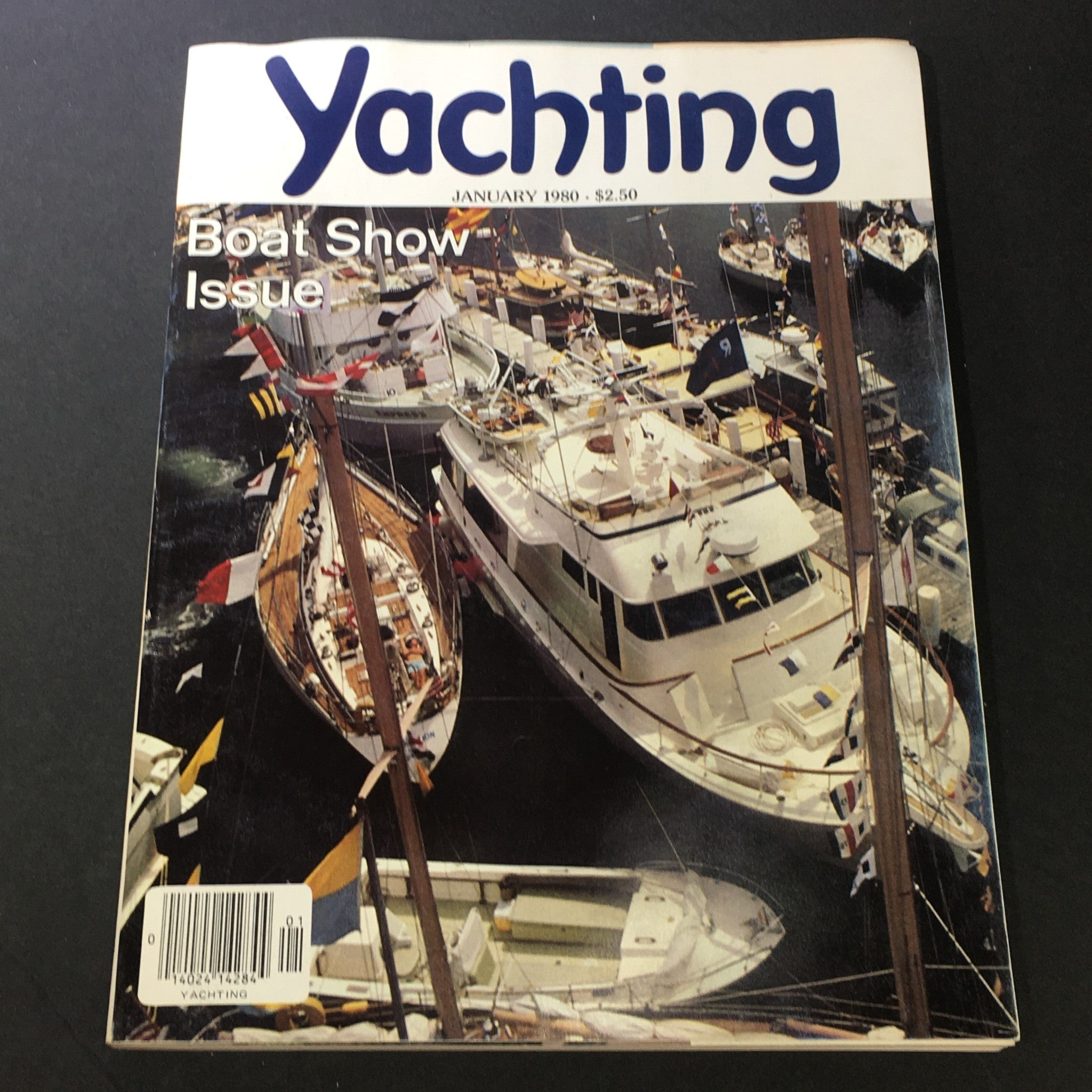 Cover of VTG Yachting Magazine January 1980, showcasing a bustling boat show with various yachts and boats in the harbor. Features bold title design and the phrase 'Boat Show Issue'. Perfect condition for collectors.