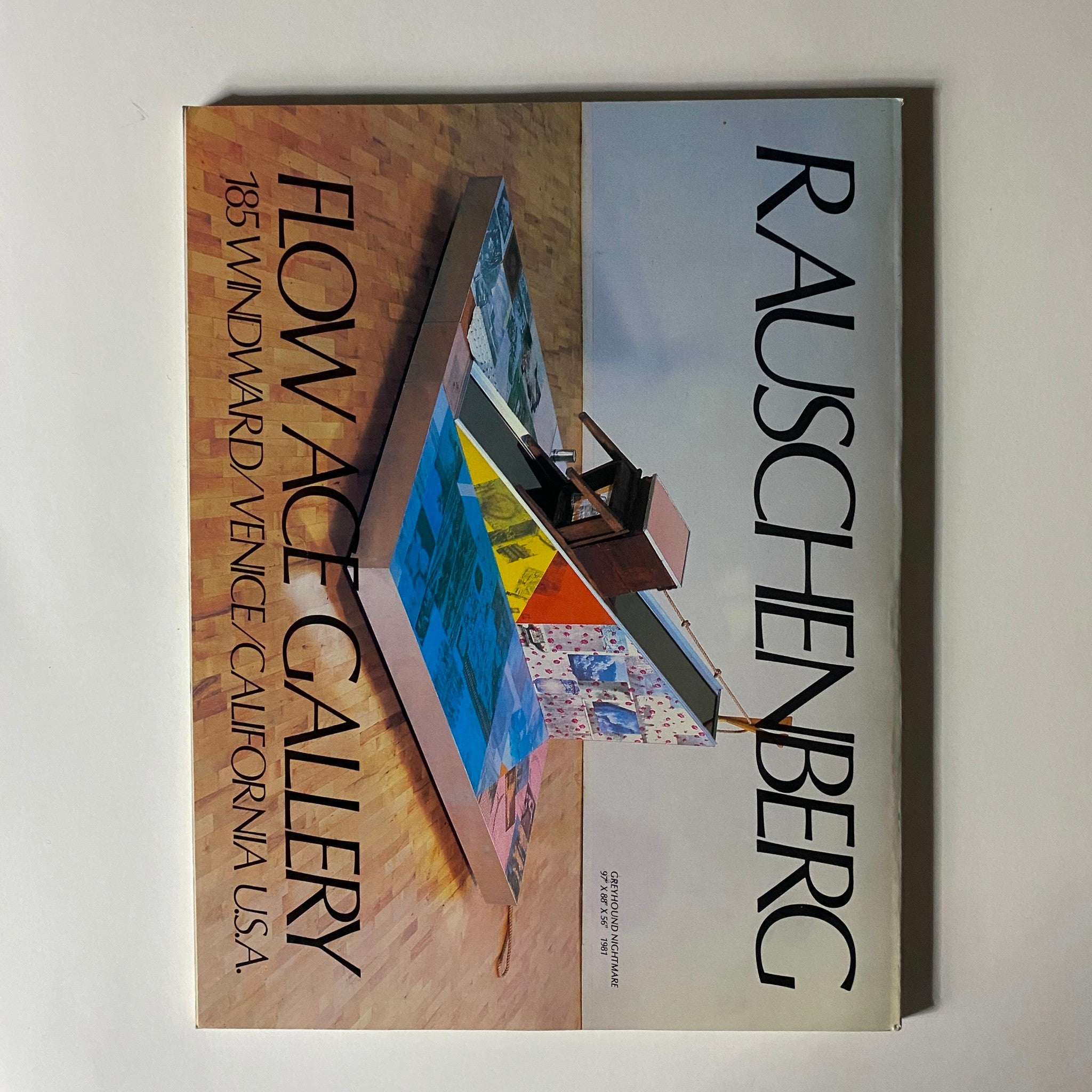 Cover of the Flow Ace Gallery magazine showcasing a vibrant Rauschenberg artwork, with text indicating the location in Venice, California, connecting it to the vintage Art in America magazine from November 1982.