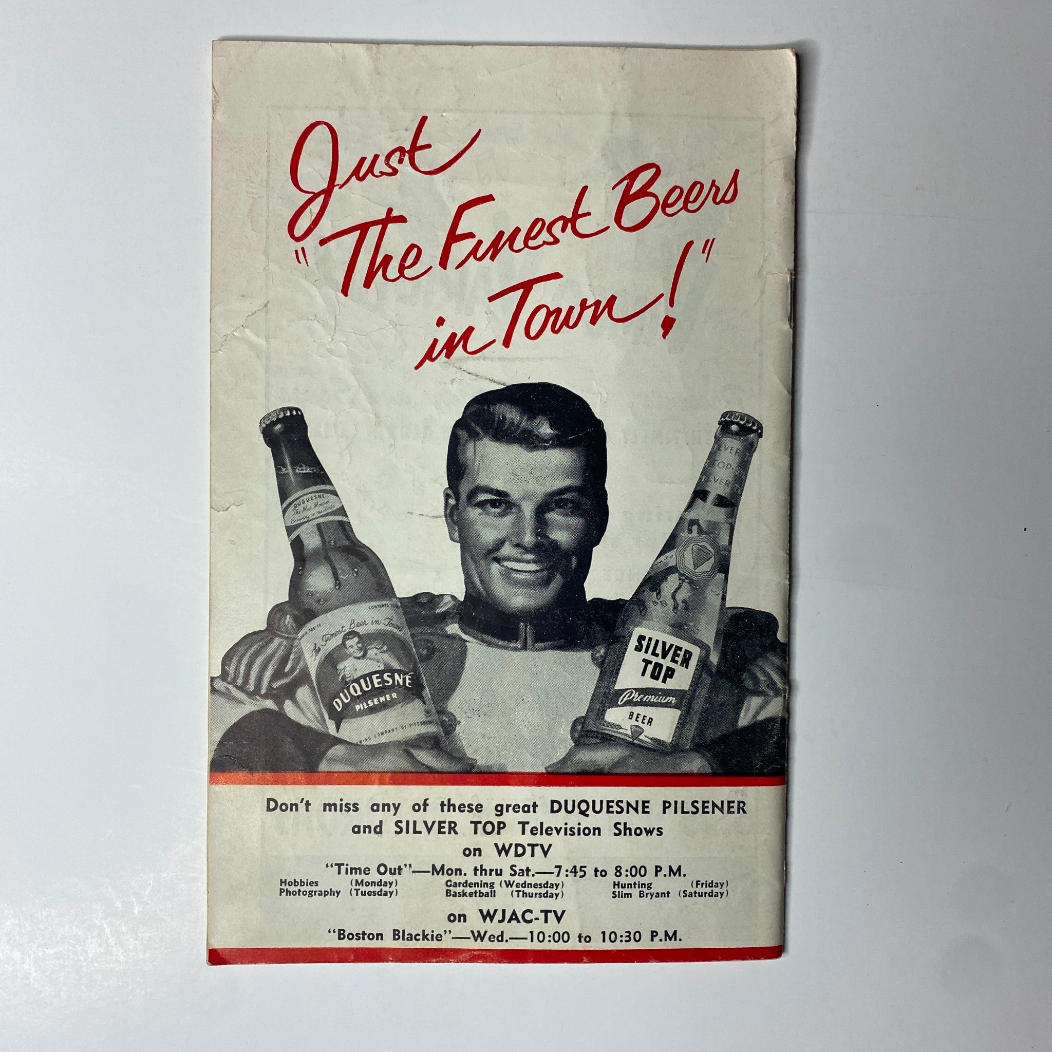 Advertisement page from TV Digest Magazine February 21, 1953 promoting Duquesne Pilsener and Silver Top beers, paired with Pittsburgh television listings.