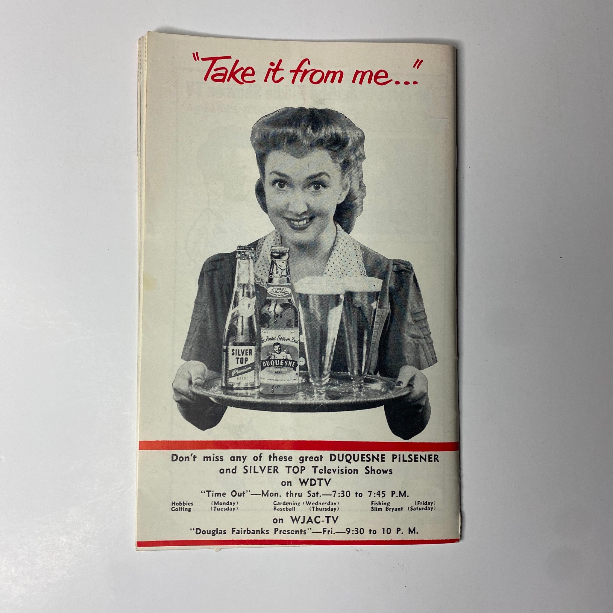 Advertisement from TV Digest Magazine, June 20, 1953 featuring a woman holding beverages with a 'Take it from me...' caption, promoting Duquesne Pilsener.