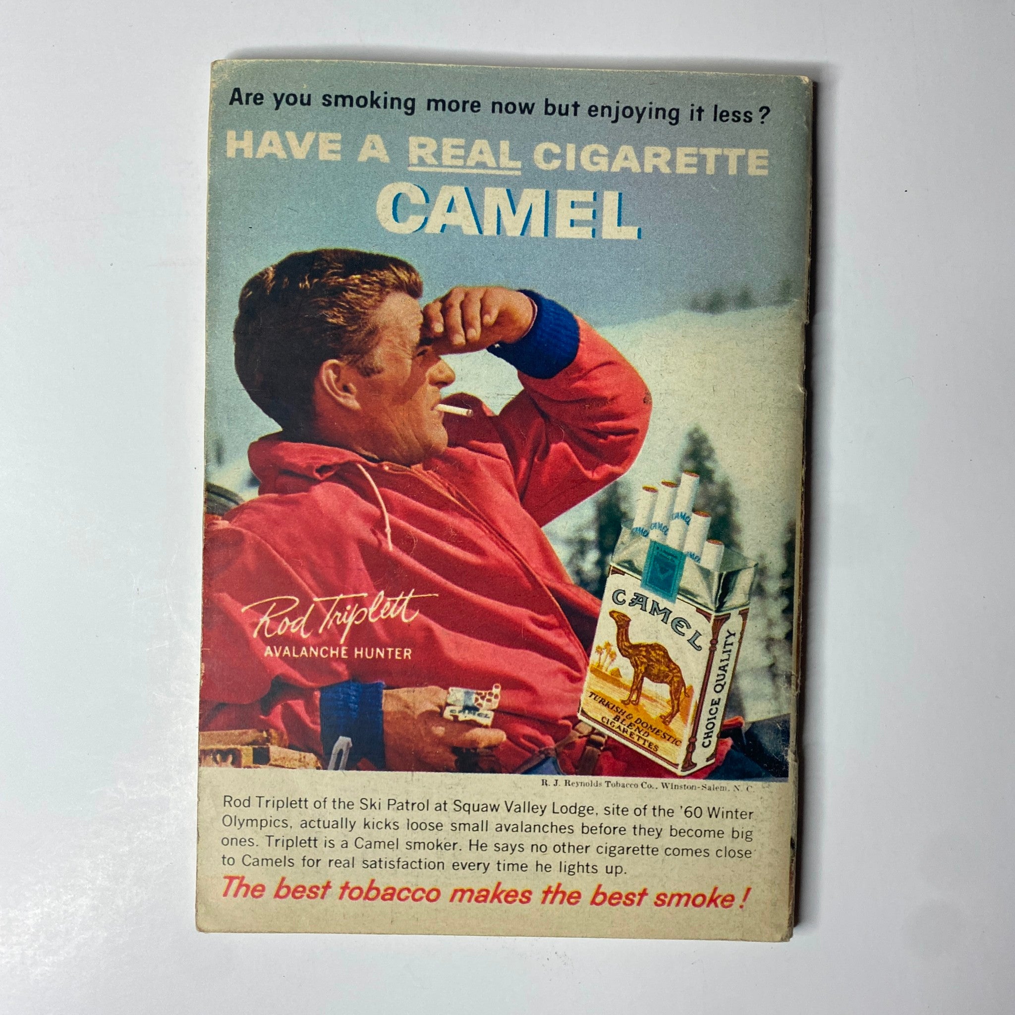 Advertisement featuring Rod Triplett, the Avalanche Hunter, promoting Camel cigarettes in a vintage TV Guide Magazine, indicative of 1960s marketing culture.