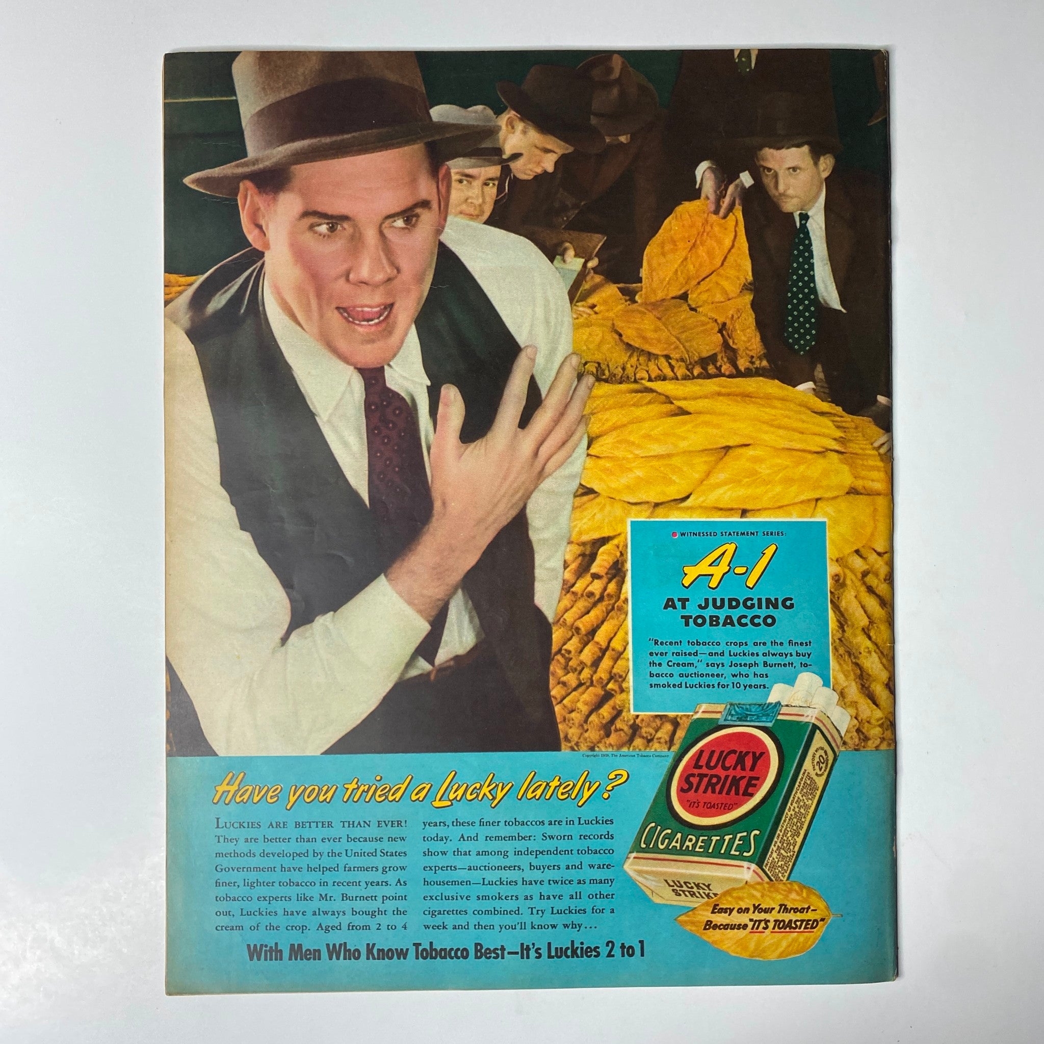 Look Magazine June 20, 1939 presents an advertisement for Lucky Strike cigarettes, featuring a man gesturing animatedly while discussing tobacco, showcasing the brand's appeal and image.