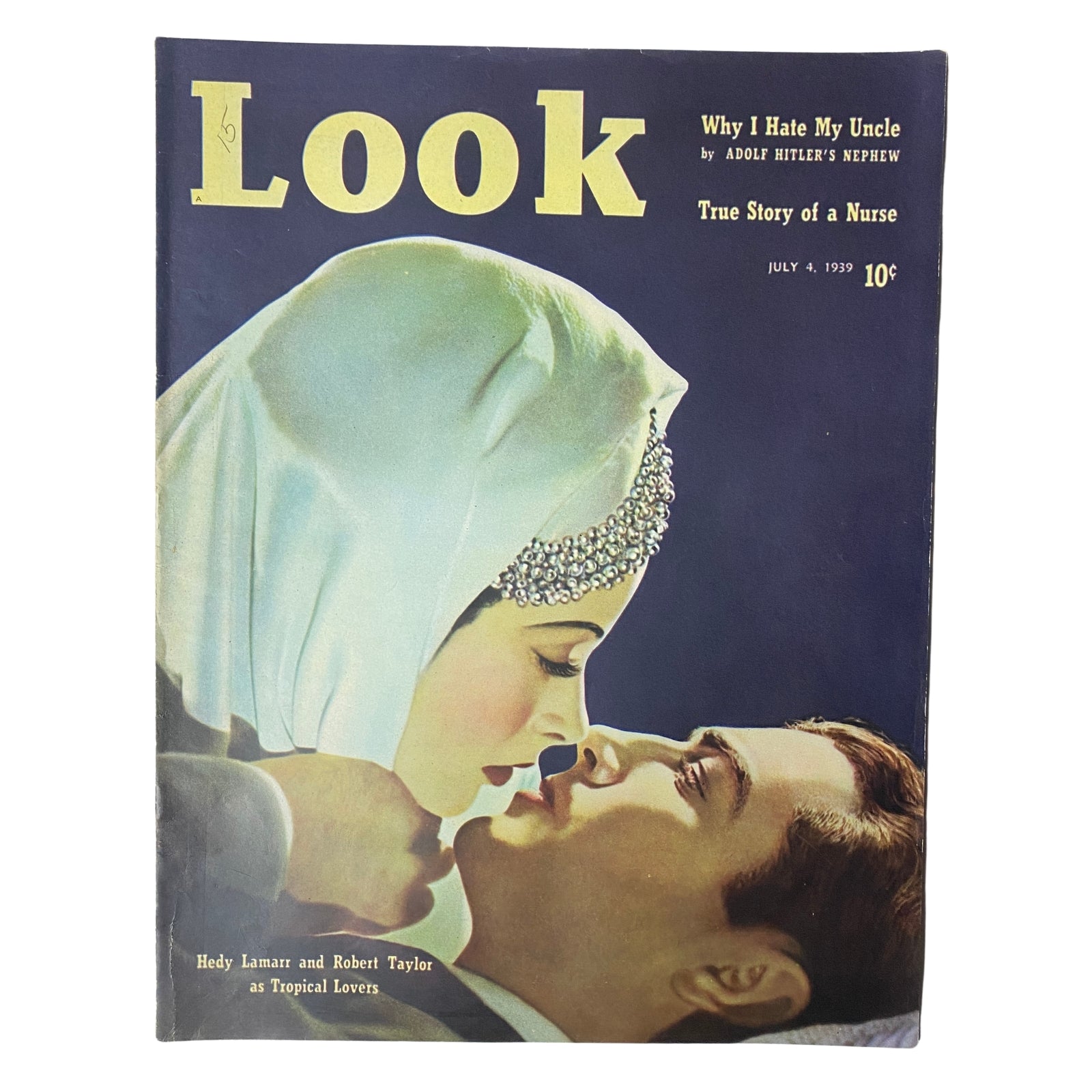 Cover of Look Magazine, July 4, 1939 featuring Hedy Lamarr and Robert Taylor as tropical lovers, highlighting the issue's themes and notable articles.