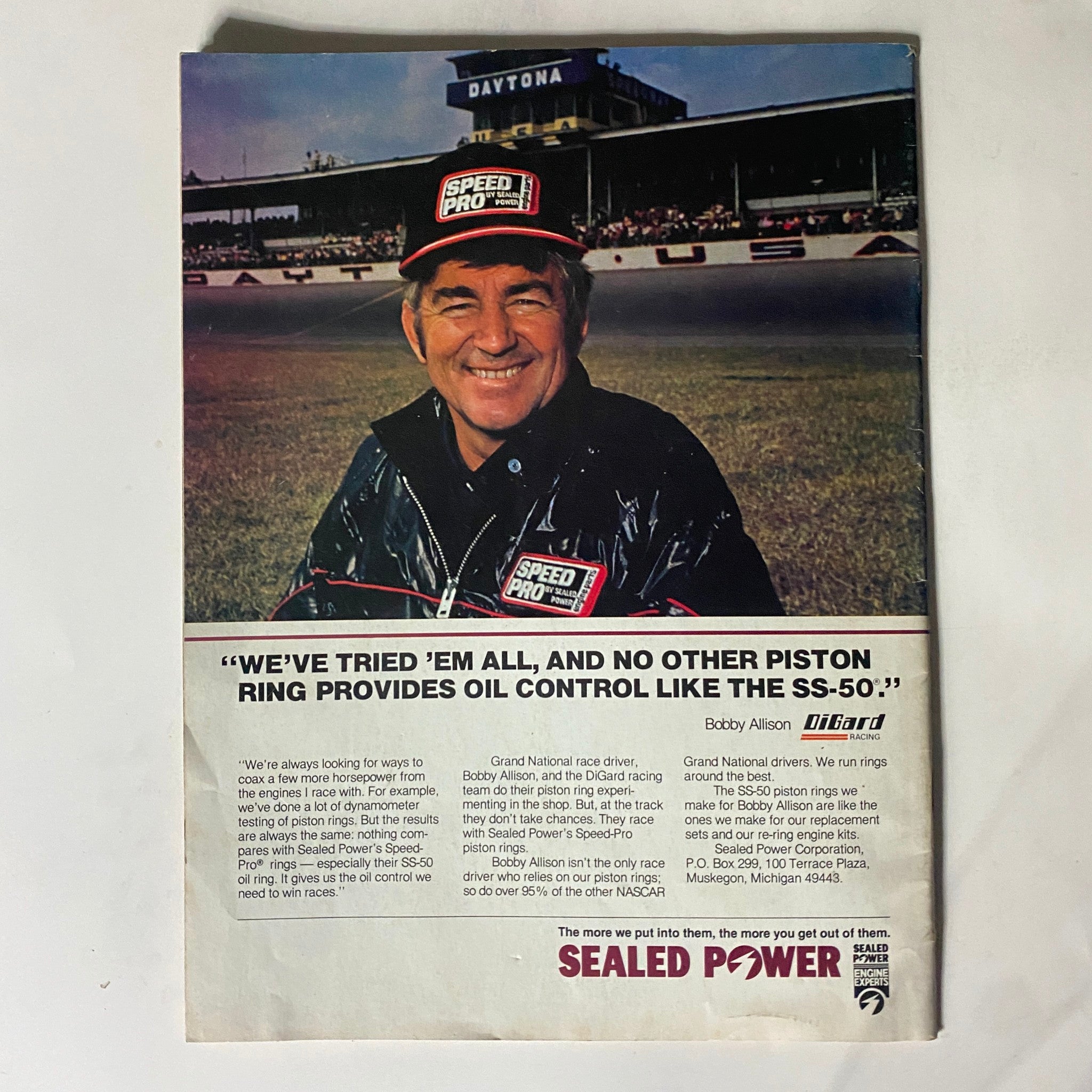 Back cover of VTG Chilton's Motor/Age Magazine December 1983, advertising Sealed Power piston rings endorsed by race car driver Bobby Allison.