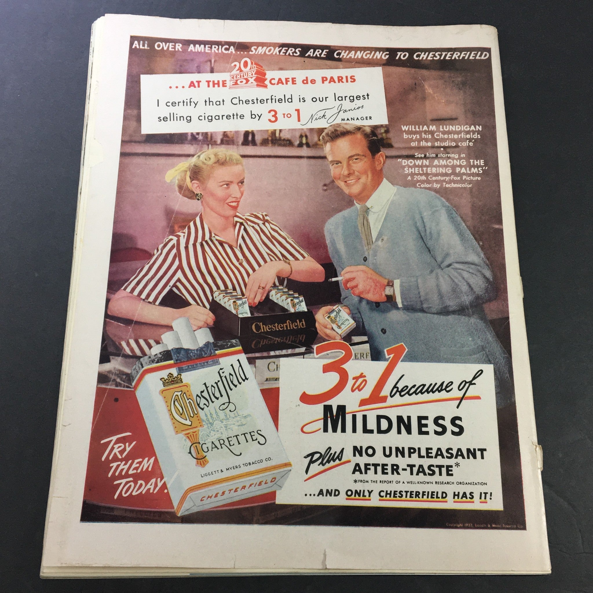 Vintage advertisement for Chesterfield cigarettes in VTG Collier's Magazine January 5 1952, illustrating mid-century marketing strategies.