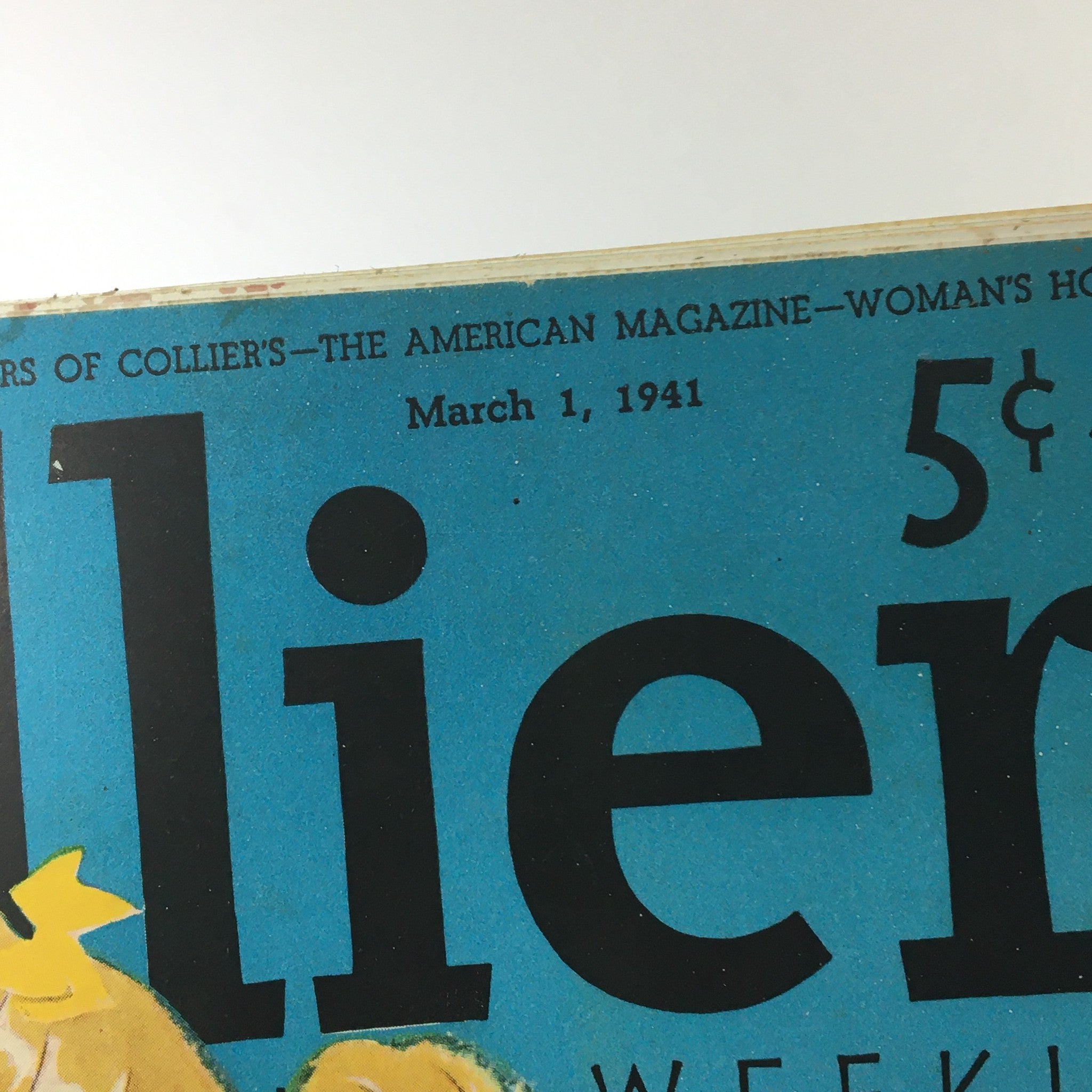 Close-up of the top section of VTG Collier's Magazine March 1 1941 highlighting the date and price.