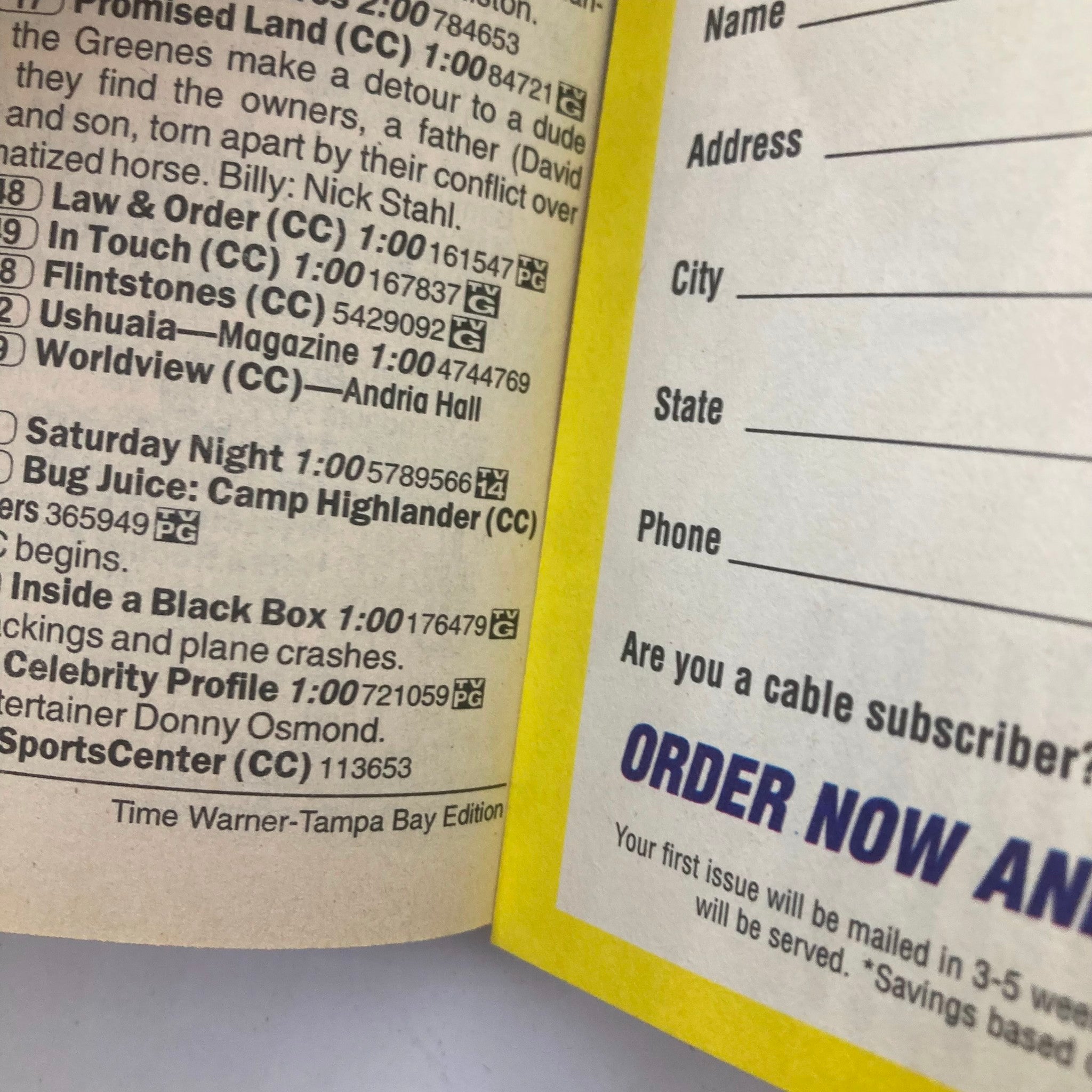 Inside pages of TV Guide Magazine July 29 2000, displaying the order form and subscription information, part of the Time Warner-Tampa Bay edition, underlining the magazine's collector value.