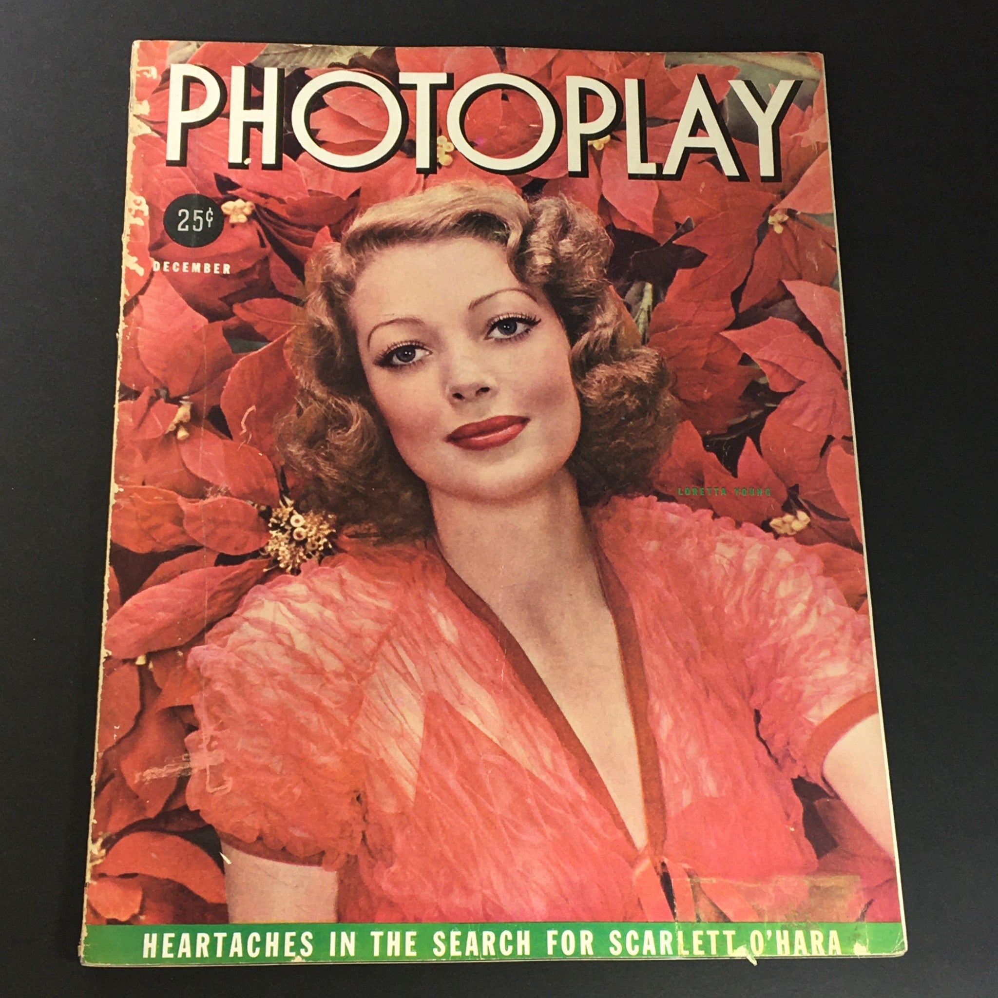 Cover of VTG Photoplay Magazine December 1937 featuring Loretta Young, showcasing vintage Hollywood glamour with vibrant red flowers.
